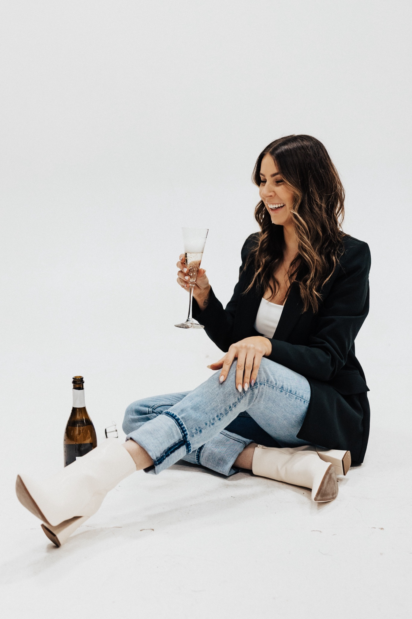 My go to business casual outfit *champagne not included*

Suit jacket: S (oversized so size down!)
Jeans: 27L
Boots: 9.5
Tank: M

#LTKstyletip #LTKworkwear #LTKsalealert