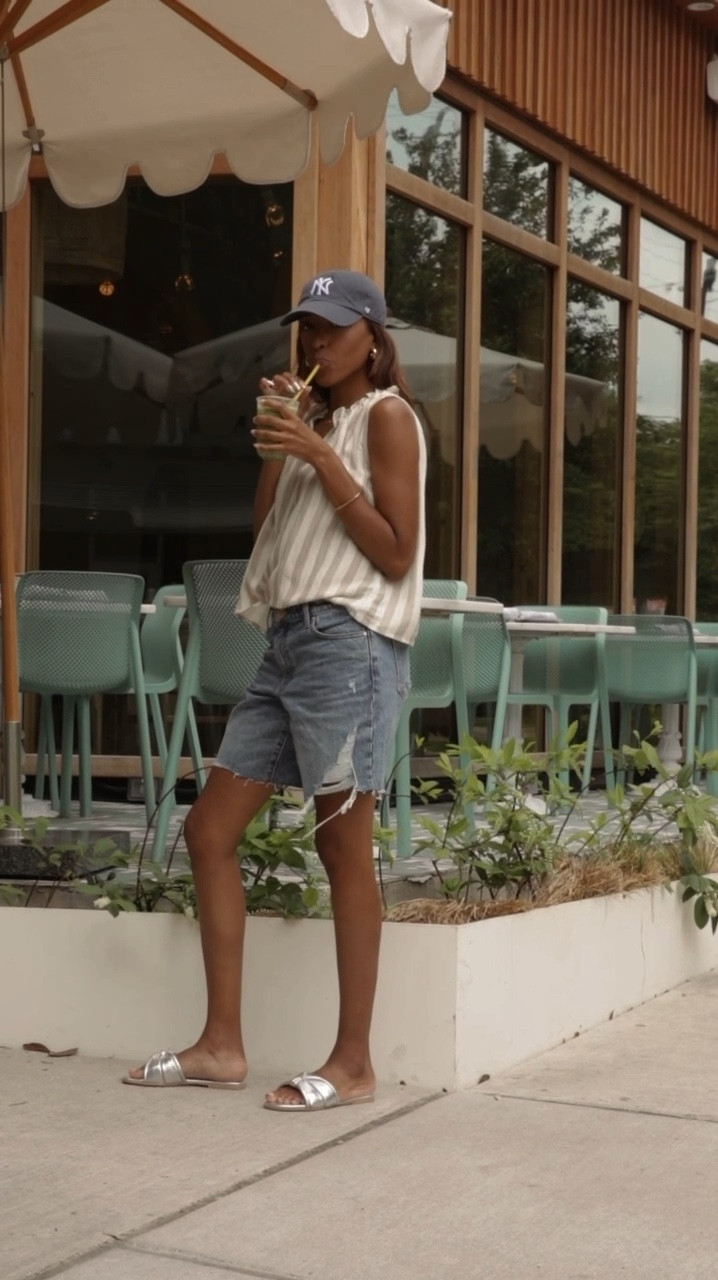 Summer outfit on the go! Sports, travel and vacations are coming up and this is the perfect outfit. Lightweight tops and comfortable denim shorts. Shorts run big so size down for a more fitted look. I’m wearing a 24. My silver sandals are the show for summer. They run true to size. 

#LTKShoeCrush #LTKOver40 #LTKStyleTip