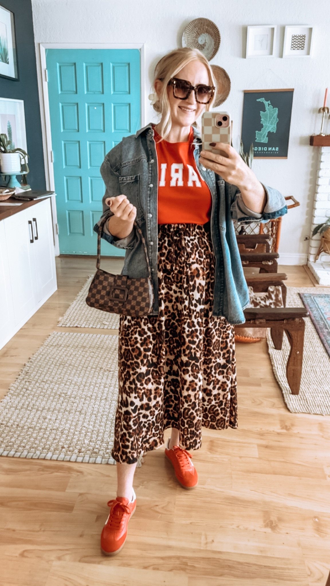 Target Haul look 4 ✨ love me a red and leopard combo!! This little Paris tee is so adorable and I love the pop of red ❤️ Wearing L in top and skirt. Denim jacket runs quite big, wearing M and could’ve done S. 

20% off SALE on women’s clothes rn at Target if you’re a Circle member 🎯Including most items in this Reel! 

SIZING INFO below: 
✨ Wearing size L unless said otherwise below
✨Denim overcoat, wearing M, runs quite big, could’ve done a S. 
✨ Flannel shirt, wearing M, runs big
✨Black 82 tee, it’s a girls tee so I’m wearing an XXL.
✨Striped pant: size down, wearing M
✨ 150 lbs and 5’7” for reference

Target haul, Target fall haul, Target style, Target finds. Target sale, Target favorites, Target tops, Target bottoms, Target outfits, fall style, fall fashion inspo, fall outfits, elevated casual, leopard print, graphic tee, denim shirt, future collective, studded flats, Mary Jane’s, target shoes, flannel shirt, suede bucket bag, suede bag

#LTKStyleTip #LTKSaleAlert #LTKFindsUnder50
