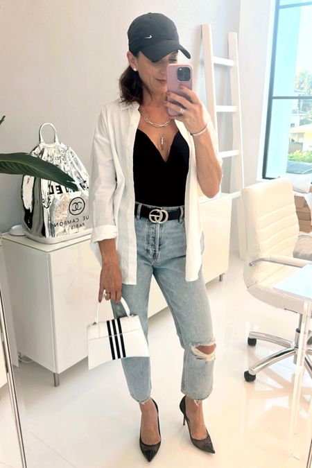 Sporty chic to the office… they all know if I have a hat on I didn’t wash my hair 🫣 replacing the blazer with a long white button up. 

#LTKStyleTip #LTKWorkwear #LTKFindsUnder100