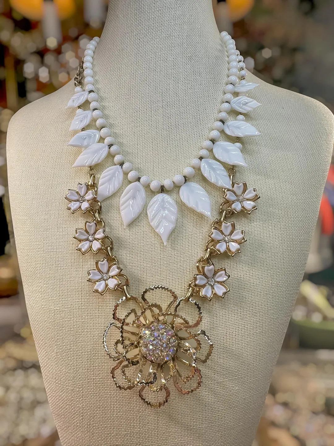 The Starlet’s Garden combines 1940’s milk glass, a 1950’s enamel floral necklace, and a 196... | Etsy (US)