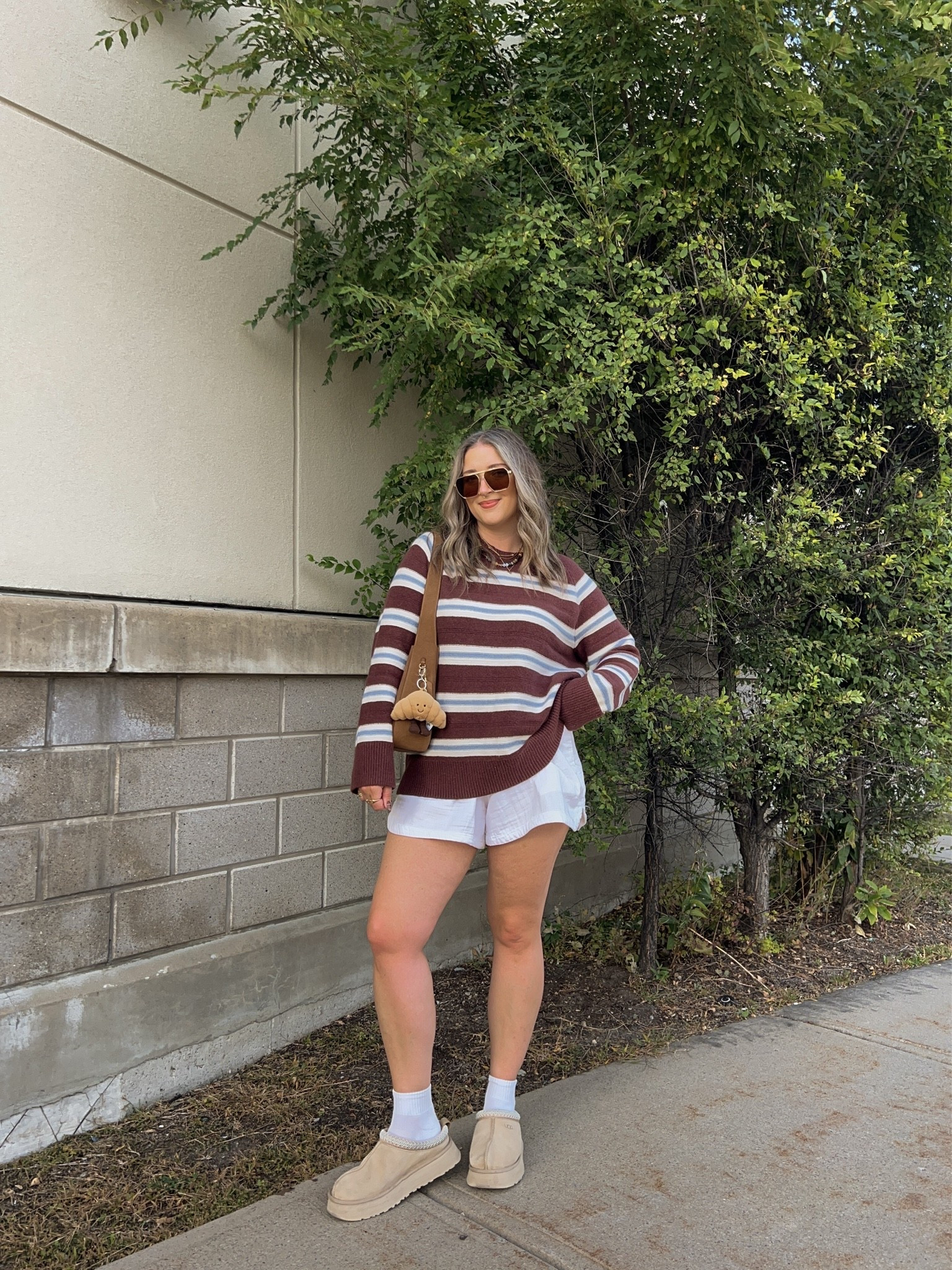 Early fall ootd! Sized up to XL in the sweater for an oversized fit. Shorts are old, linked similar. I’m a 9.5-10 shoe and wear a 10 in the Ugg Tazz platforms

#LTKfall #LTKmidsize #LTKstyletip