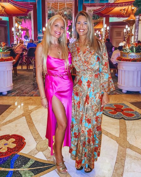 A silky fuscia midi dress and a maxi floral wrap dress for a lovely dinner at the Wynn. I couldn't link her exact dress so I linked similar. Also linked some chunky gold chain pendant necklaces just like mine! 

#LTKstyletip #LTKSeasonal #LTKtravel
