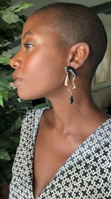 My favorite Amazon purchase this week! Gold and black asymmetrical earrings. They also come in all gold and all silver  

#LTKfindsunder50 #LTKVideo #LTKstyletip