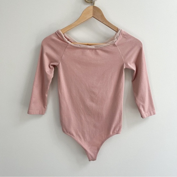 [wolford] RARE high shine 3/4 sleeve tulle trim thong bodysuit blush pink XS | Poshmark
