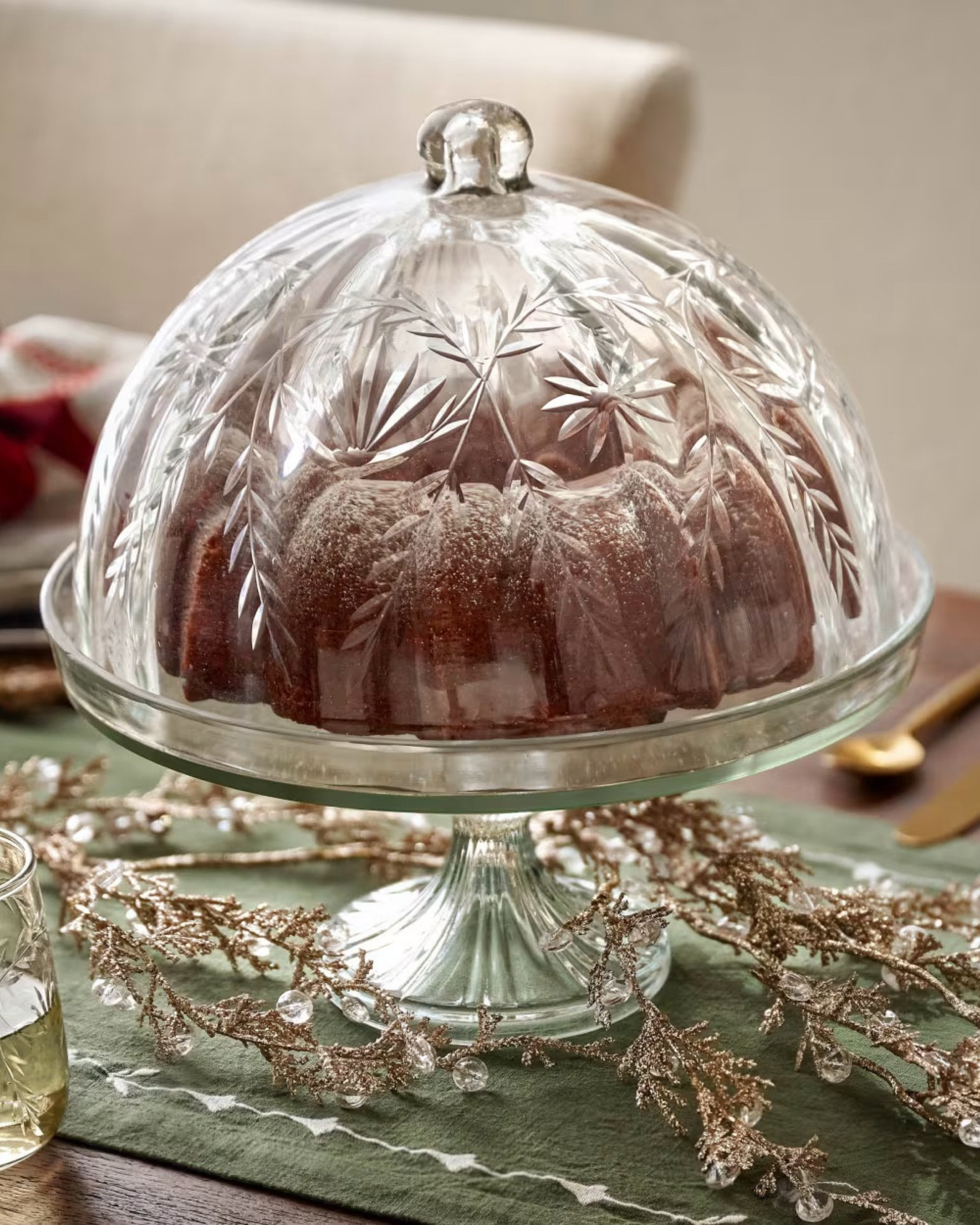 ✨SALE✨ Elevate your baked goods with the timeless elegance of the Vivian Cut Glass Cake Stand. Crafted from glass and adorned with a delicate vine pattern, this stand brings a touch of vintage charm to any table setting. The ribbed pedestal base adds a grounded, sophisticated look, making it a perfect centerpiece for showcasing cakes, pastries, and more. For a coordinated and stylish kitchen display, pair it with the Vivian Cut Glass Canister, Serving Bowl, and Stemless Glass, creating a seamless collection that exudes both beauty and function.

#LTKSaleAlert #LTKHoliday #LTKHome