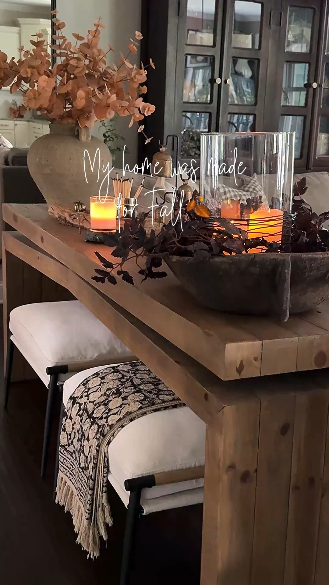 My home was absolutely made for Fall!! The rich tones and colors always look the best🤎🍂

Console table, ottomans, floral throw blanket, taupe vase, toasted eucalyptus, white eucalyptus, vintage wood mortar, vintage bowl, plum stems, moody hydrangeas, round coffee table, woven storage boxes, pedestal bowl, dried gourds, floor lamp with woven shade, chandelier, brass salt & pepper mills, floral green crock, burgundy magnolia wreath, round marble board, island pendants, black serving board, woven vase, greenery stems, vintage board

#LTKstorytime #LTKSeasonal #LTKHome