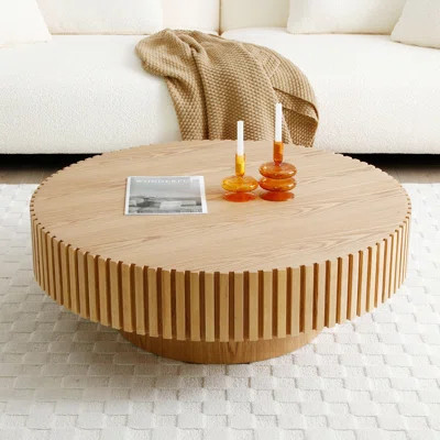 Ansel Round Pedestal Coffee Table with Ribbed Detailing | Wayfair North America