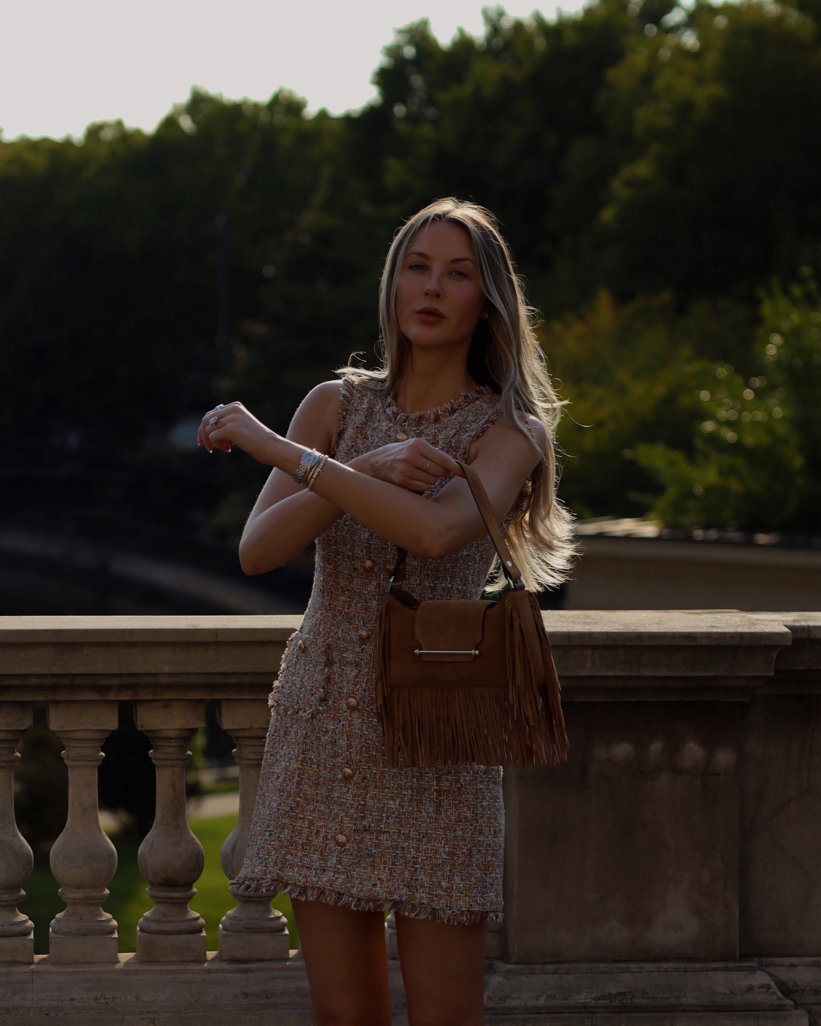 Early fall transitional outfit
Tweed dress
Suede bag
Fringe bag