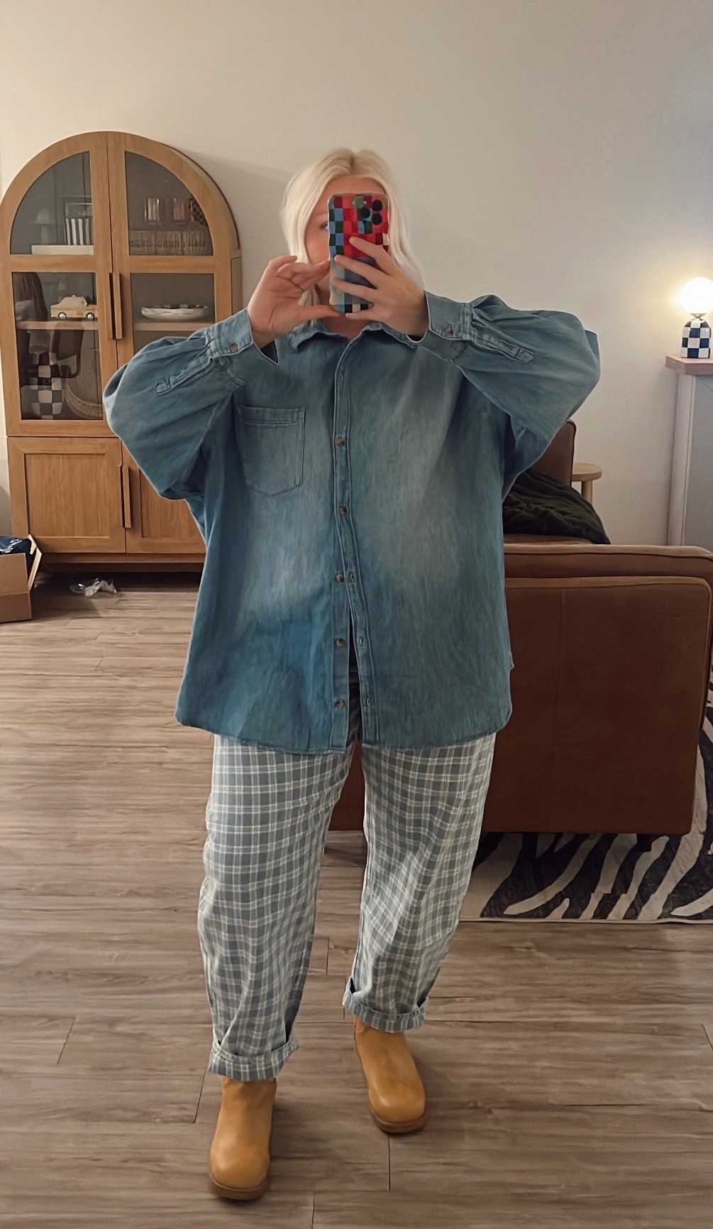 XL top, large jeans. These jeans run true to size. 
