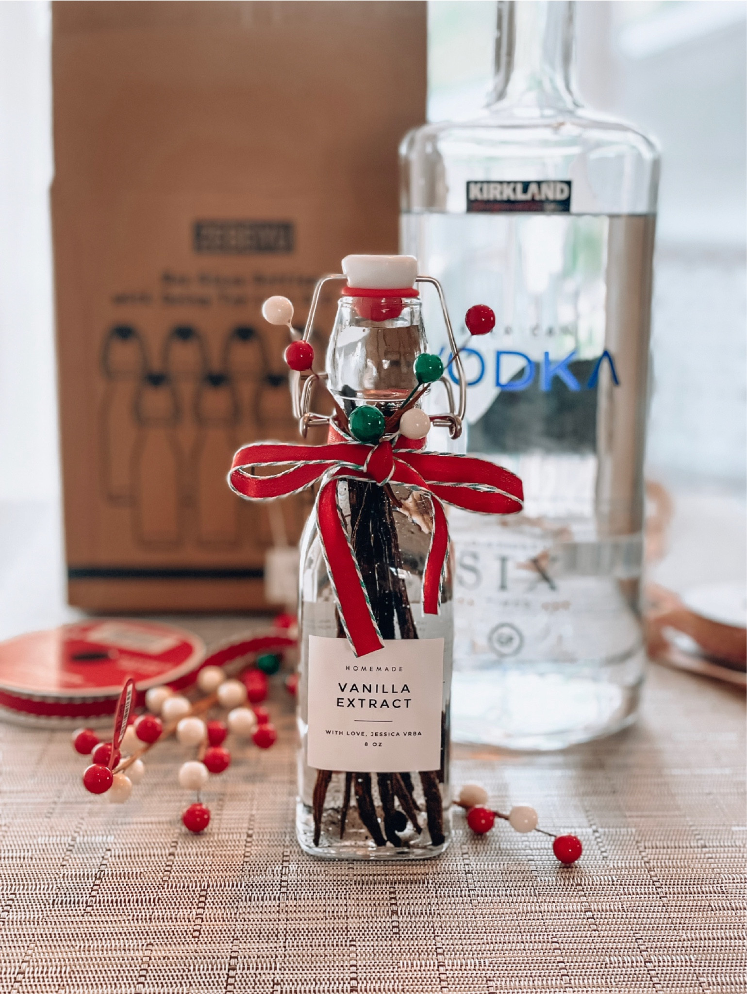 Home to make homemade vanilla extract!

What you’ll need:
- 8oz bottles (mine are from Amazon)
- Customized bottle labels from Etsy’s Paper and Pear (URL below)
- A funnel
- Inexpensive vodka (I used Costco’s vodka)
- Tahitian or Madagascar vanilla beans (grade B; I got mine from Amazon Fresh)
- Cute decorative ribbon
- Cute decorative picks

DIRECTIONS:
1) Place your customized labels on the 8oz bottles 
2) Splice 3/4 the way up the vanilla beans and place 5 into each bottle
3) Use your funnel to top the 8oz bottle with vodka
4) Add your decorative ribbon and picks

**For full favor, wait at least 2 months before use!**

Paper and Pear Custom Labels Etsy Shop: https://www.etsy.com/shop/PaperAndPearStore
*Type in “homemade vanilla extract” for the exact labels I used

#LTKparties #LTKHoliday #LTKGiftGuide