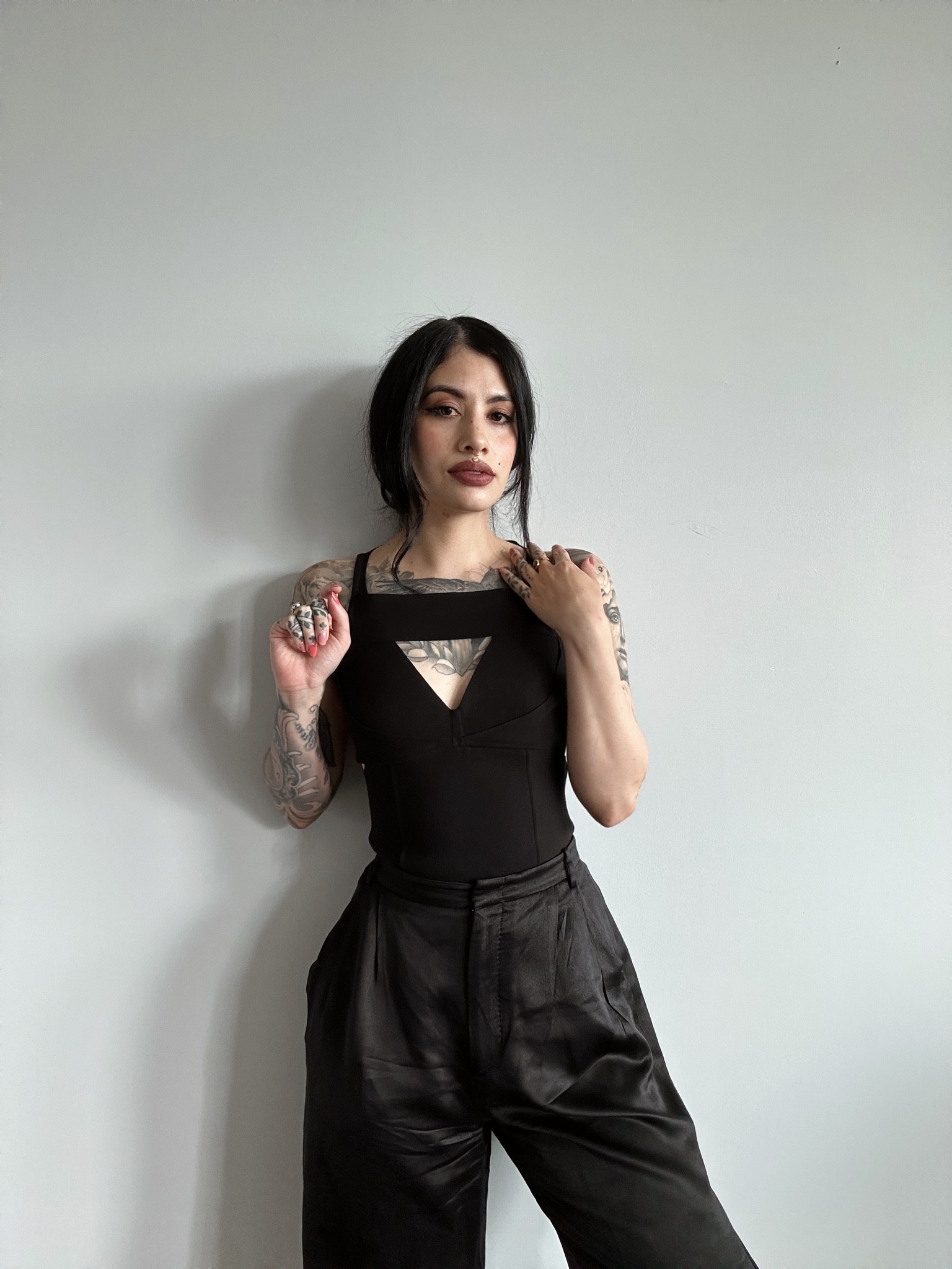 Black cut out sleeveless top, black satin silk pants, all black outfit 

#LTKFind #LTKstyletip