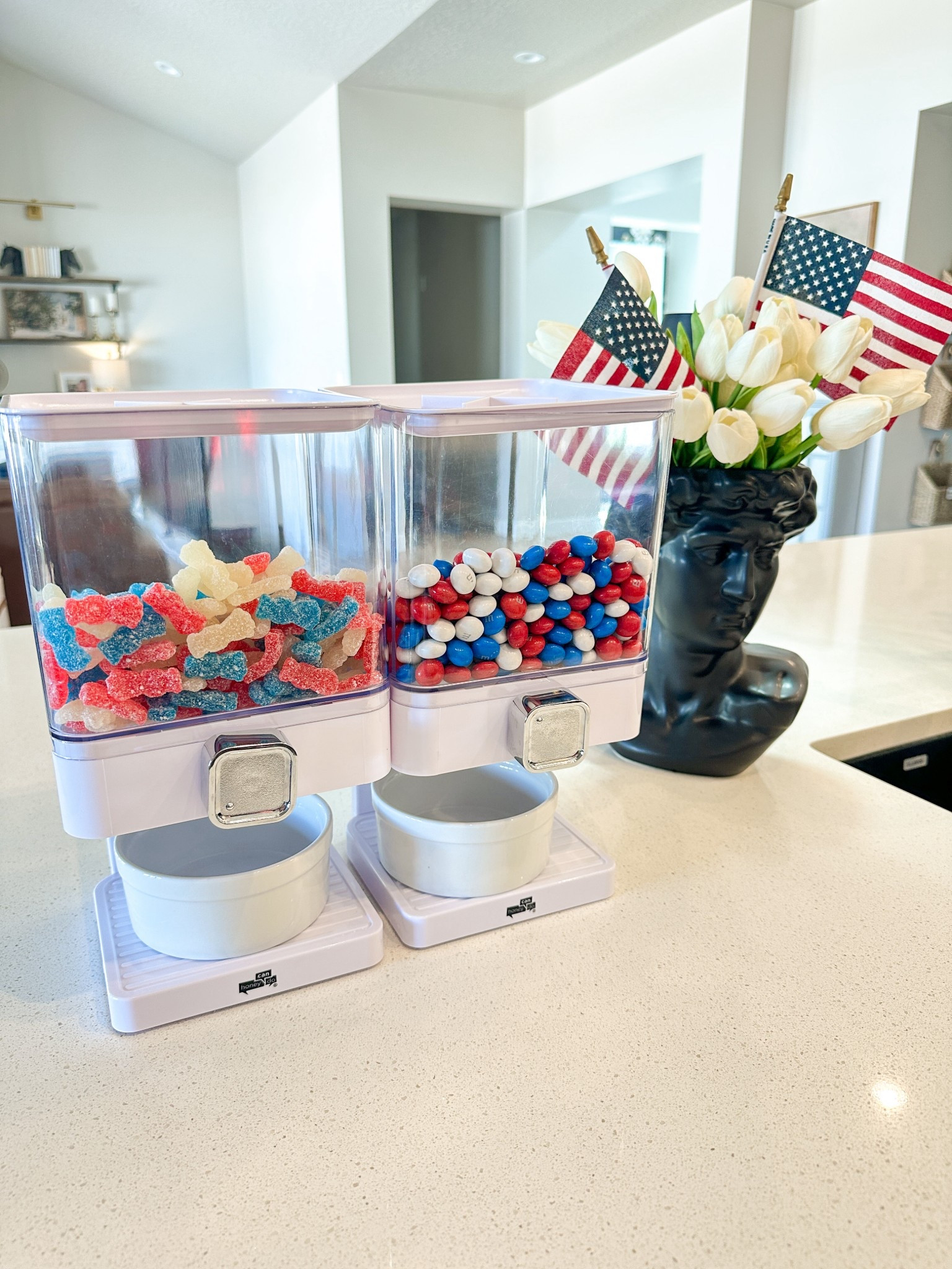 Turning up the fun this 4th of July with these red, white, and blue candy dispensers! They’re such a fun and festive way to serve treats at your 4th of July party, parade setup, or backyard BBQ—and the kids (and adults!) love them.
We filled ours with a mix of patriotic-colored sweets, and they’re perfect for grabbing a quick treat without the mess.
Here are some fun 4th of July candy ideas to use in your dispensers:
	•	Red, white & blue M&Ms
	•	Cherry and blue raspberry jelly beans
	•	Red licorice bites
	•	Star-shaped gummies
	•	Sour Patch Kids (red & blue)
	•	Mini gumballs
	•	Red, white & blue Sixlets or Skittles
	•	White chocolate pretzel bites with sprinkles
These 4th of July candy dispensers double as decor and snacks, making them perfect for a patriotic dessert table, candy bar, or even for gifting!

4th of July party ideas, patriotic candy bar, red white and blue treats, dessert table inspiration, candy dispensers, festive snacks, Independence Day fun, party decor ideas, backyard BBQ treats, summer celebration essentials

#LTKSeasonal #LTKSummerEdit #LTKFamily