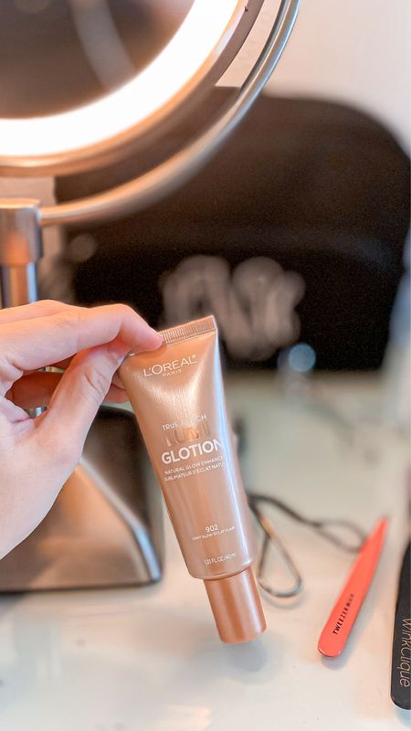 This stuff is amazing. Hydrates my skin while literally giving the prettiest glow. Perfect as a primer and the moisturizing aspect helps fill fine lines. I wear it under my Giorgio Armani foundation. And it’s drugstore price… what!?! L’Oréal LUMIglotion for the WIN!

#LTKbeauty #LTKstyletip #LTKworkwear