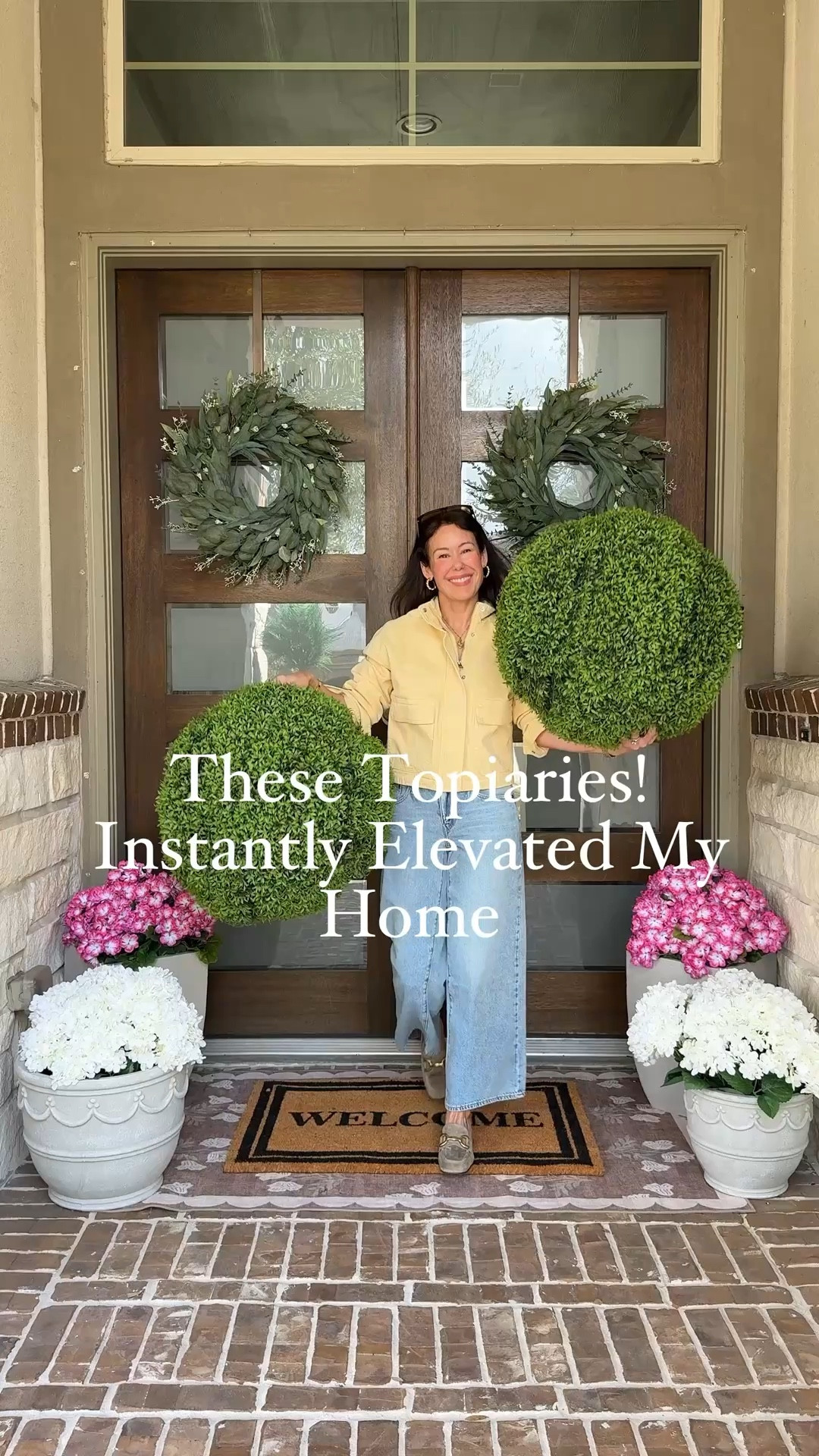 These topiaries completely elevated my front porch 🌿 I love when a simple addition makes such a big impact. They come in a set of two, and the size and quality are honestly so good in person. If you’ve been wanting that polished, elevated porch look… these are it. Linking them here because they’re absolutely worth it.

front porch decor, outdoor topiary trees, faux topiary set of 2, front door styling ideas, porch decorating ideas, outdoor entryway decor, neutral home decor, modern organic exterior decor, outdoor planters styling, elevated porch styling, realistic faux greenery, front porch refresh, curb appeal ideas, outdoor home styling, large faux topiary trees, classic porch decor, timeless exterior styling, neutral outdoor decor, porch makeover ideas, entryway curb appeal, realistic artificial plants, front porch greenery. Spring front porch. Amazon home finds 

#LTKSeasonal #LTKHome