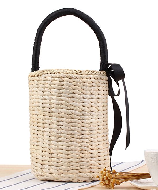 Belle de Jour Women's Handbags Primary - Natural Straw Bow-Accent Bucket Bag | Zulily