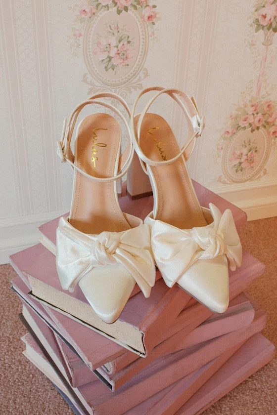 Suttonn Ivory Satin Bow Ankle Strap Pointed-Toe Pumps | Lulus