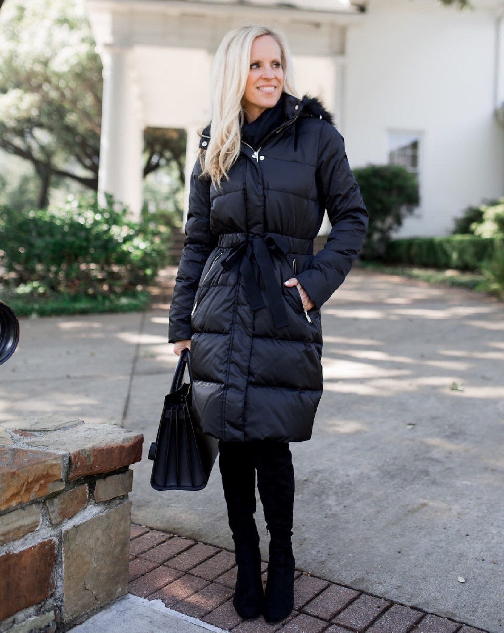 Flattering black puffer coat, tall black boots and black purse. 

#LTKSeasonal #LTKstyletip #LTKshoecrush