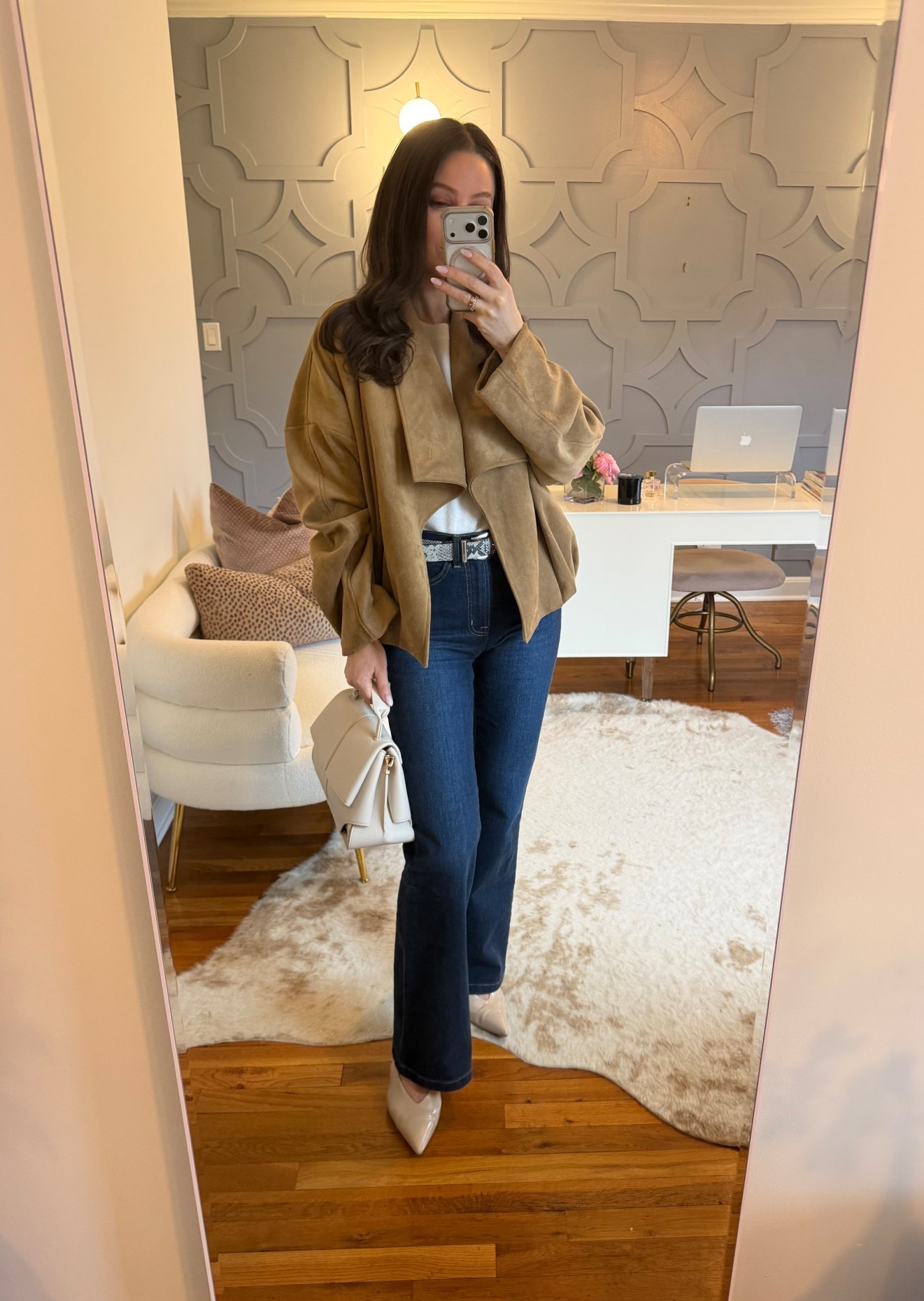 A chic transitional spring outfit! 
This top is a staple, so comfortable and runs true to size. 
The jacket runs oversized and is meant to. I did my true size small. 
The jeans are the most flattering in the land. True to size and come in different lengths. I did the regular length — I’m 5’5 and a half! 

#LTKOver40 #LTKSeasonal #LTKootd