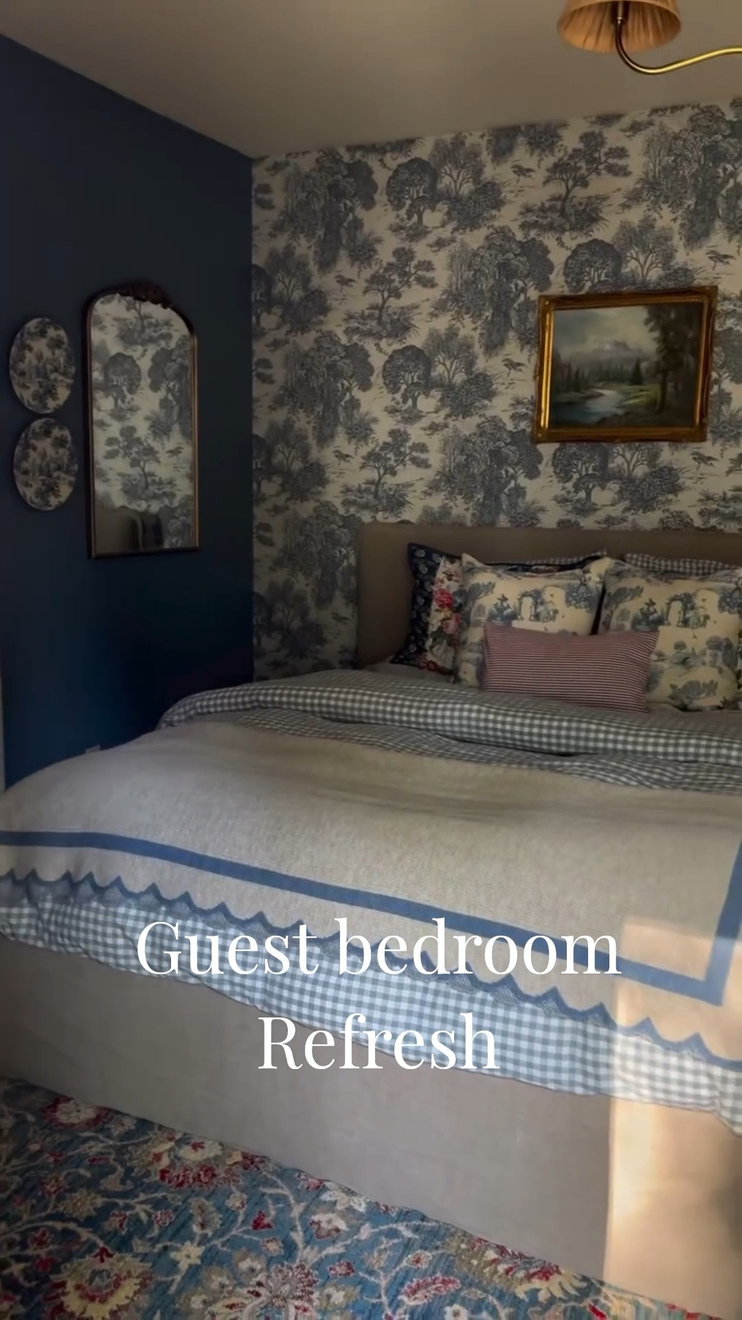 PART 2 of the guest bedroom refresh is all about the finishing touches. I had so much fun mixing in some additional patterns from @twopagescurtains 

I choose a classic red pinstripe for the curtains and since this is a sliding door(bye bye dated vertical blinds), had them lined with a blackout liner so guests can sleep in. And, coordinated with some fun pillow covers and this new blue toile is simply divine. It has the best toile scene. We also replaced our curtain rod with this custom bronze one. It’s so well made and comes with matching rings. Scallop throw blanket, gingham duvet cover set, duvet insert, toilet wallpaper, pillow shams, floral patchwork sham with embroidery, stripe upholstered chair, gold light fixture, gold chandelier with shades, gingham lampshade, nightstand, rug

Enter code “SUMMER” on the website during checkout and save 20% off sitewide. They have so many wonderful items to choose from. 

Comment SHOP below to receive a DM with the link to this post on my LTK ⬇ https://liketk.it/6cSaq ltksalealert ltkhome ltkvideo ltkseasonal #cottagestyle #twopageshome

#LTKHome #LTKSaleAlert #LTKSeasonal