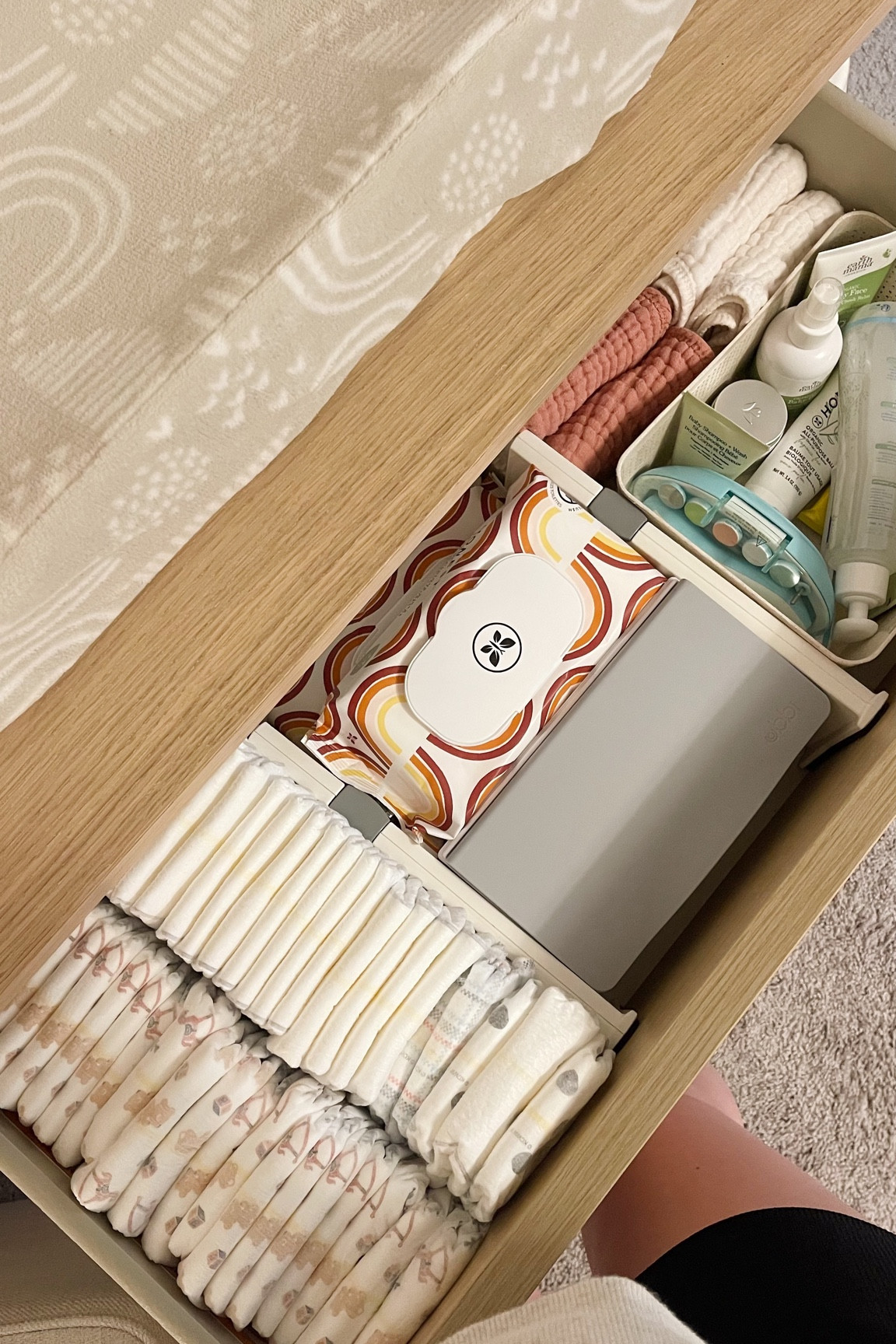 diaper changing station ✨ diapering essentials, all my favorite products. organic and unscented lotions, balms & oils. the weighted wipes dispenser is a must have, keeps wipes moist & from sticking together! 

#LTKbaby #LTKfamily #LTKkids