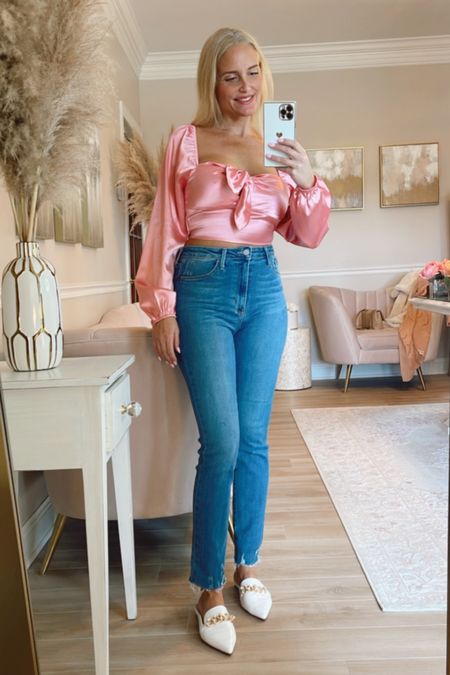 These jeans are a cross between straight leg and skinny and they are very comfy!  Also linking these flat white mules and some cute pink satin tops.