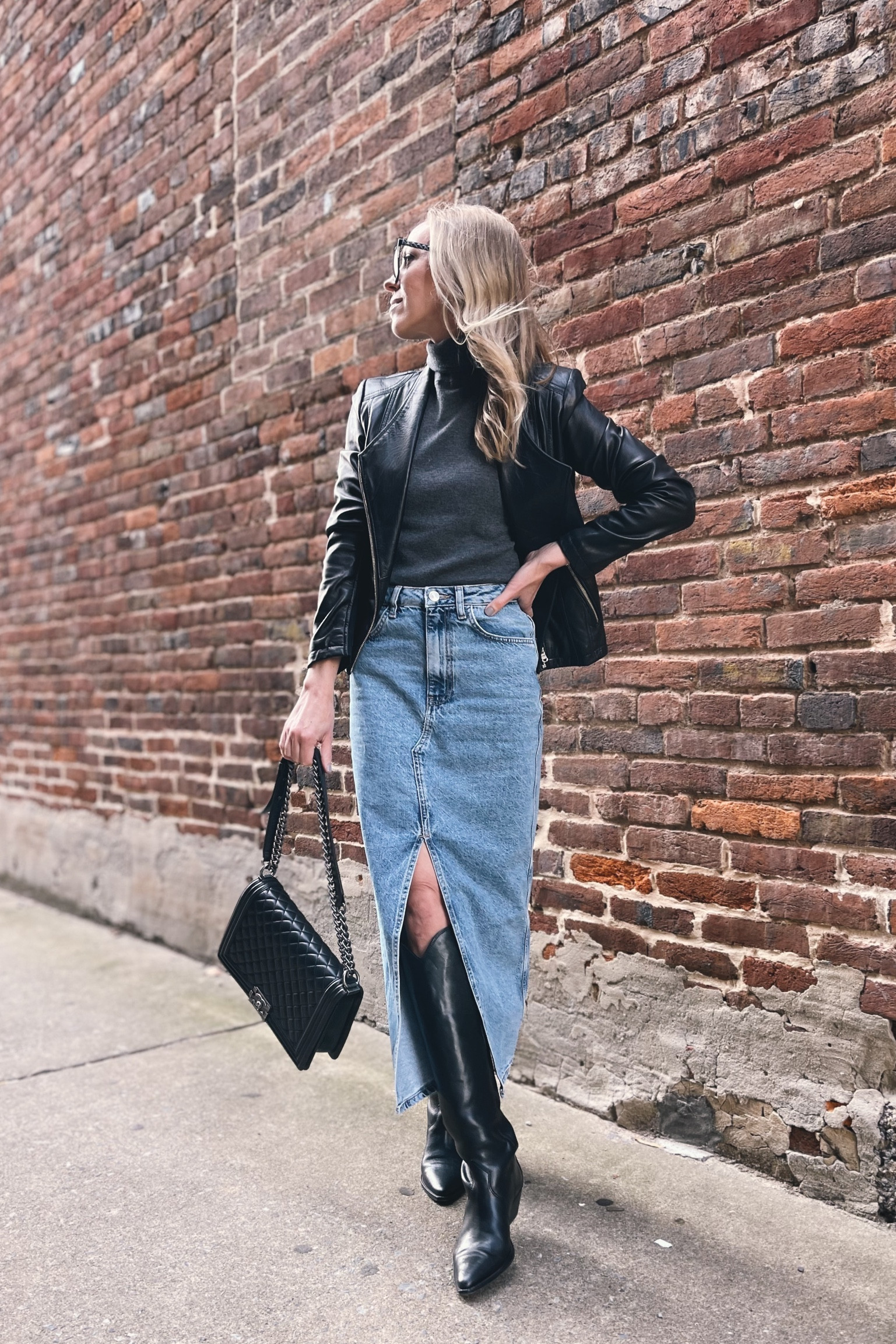 Leather jacket, fall outfit, denim midi skirt, black western boots, cowboy boots, minimal style 

#LTKfindsunder50 #LTKshoecrush #LTKstyletip