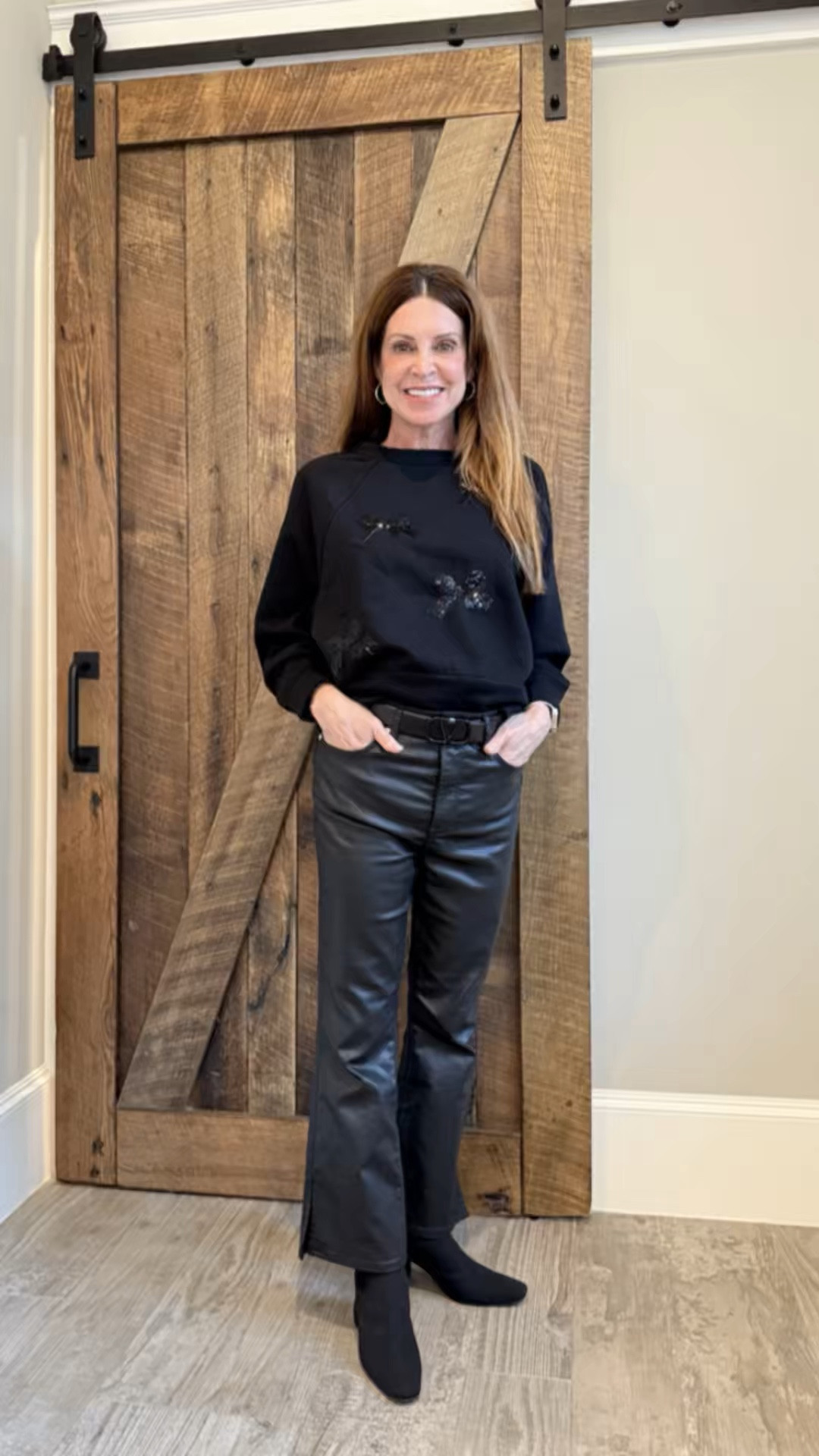 If you don’t have a pair of black coated jeans in your closet, I recommend getting some because they can be dressed up or down. This is a kick crop style with side slits at the hem. They run tts. I’m wearing a 4 P for a slightly looser fit. The 2 P would fit me too. Available in regular and petite.

My bow sweatshirt is almost sold out, so grab one asap!

#LTKSaleAlert #LTKOver40 #LTKStyleTip