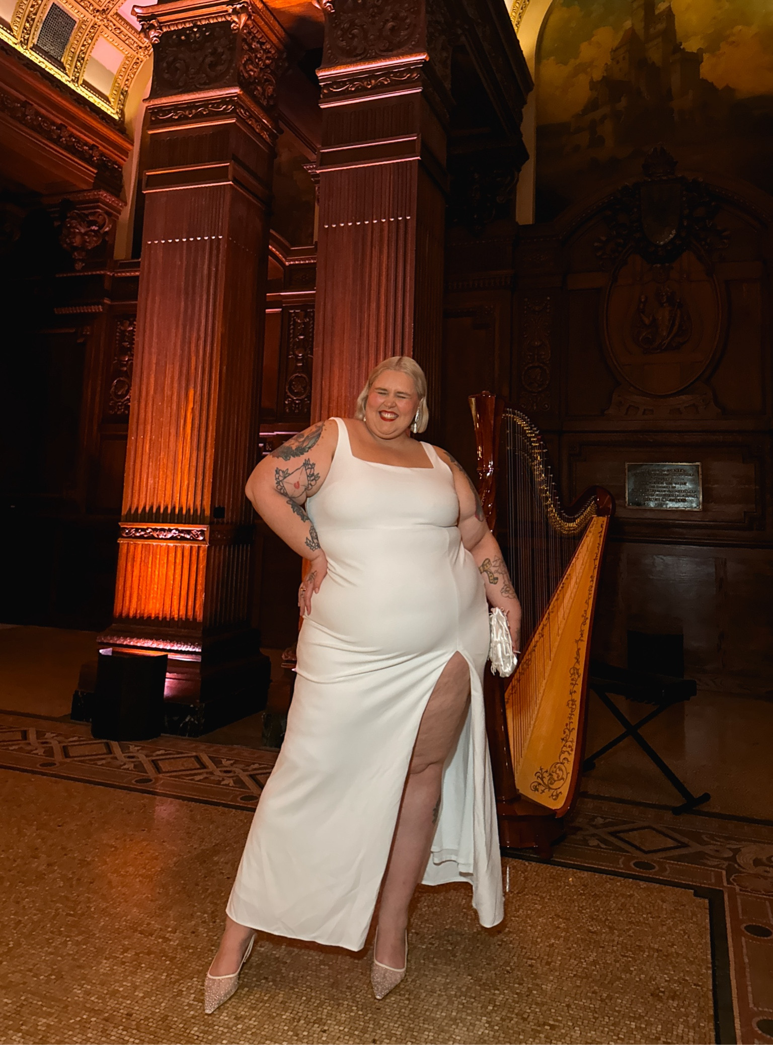 The perfect white dress for any and all bridal events! The fabric has a beautiful stretch to it that makes it super comfortable for eating and sitting without sacrificing the dresses structural integrity. Dress and clutch both on sale. Wearing a 3x! 

#LTKPlusSize