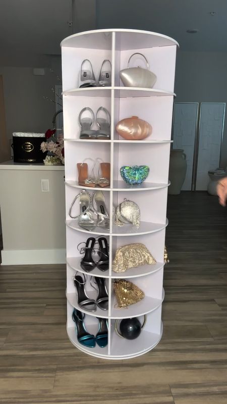 Closet Organization Pt. I — Shoes & Bags✨ 

Obsessed with this rotating accessories rack!  It’s 7 tiers and holds over 35 shoes or bags, and rotates 360 degrees so you can find everything easily! • #todaysoutfit #outfit #fashion #styletips #outfitideas #grwm #fashionstyle #styling #home #homeorganization #homedecor

#LTKfindsunder100 #LTKbeauty #LTKstyletip