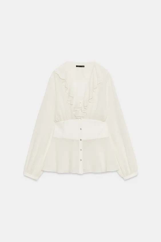 Model height: 178 cmV-neck shirt featuring ruffles and long sleeves. Fitted waist with smocked el... | Zara NL