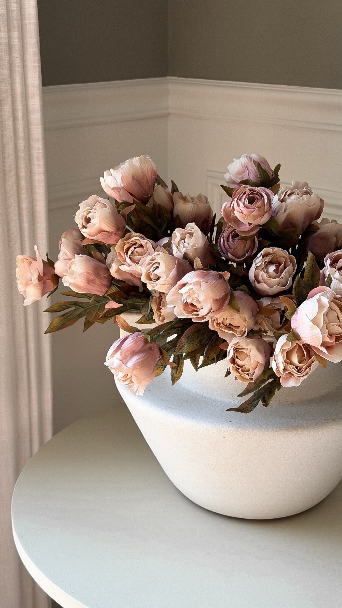 These faux silk peonies are a beautiful mauve color that I love for year round styling! They’re affordable, realistic, and add the perfect subtle pop of color to any room.

#LTKHome