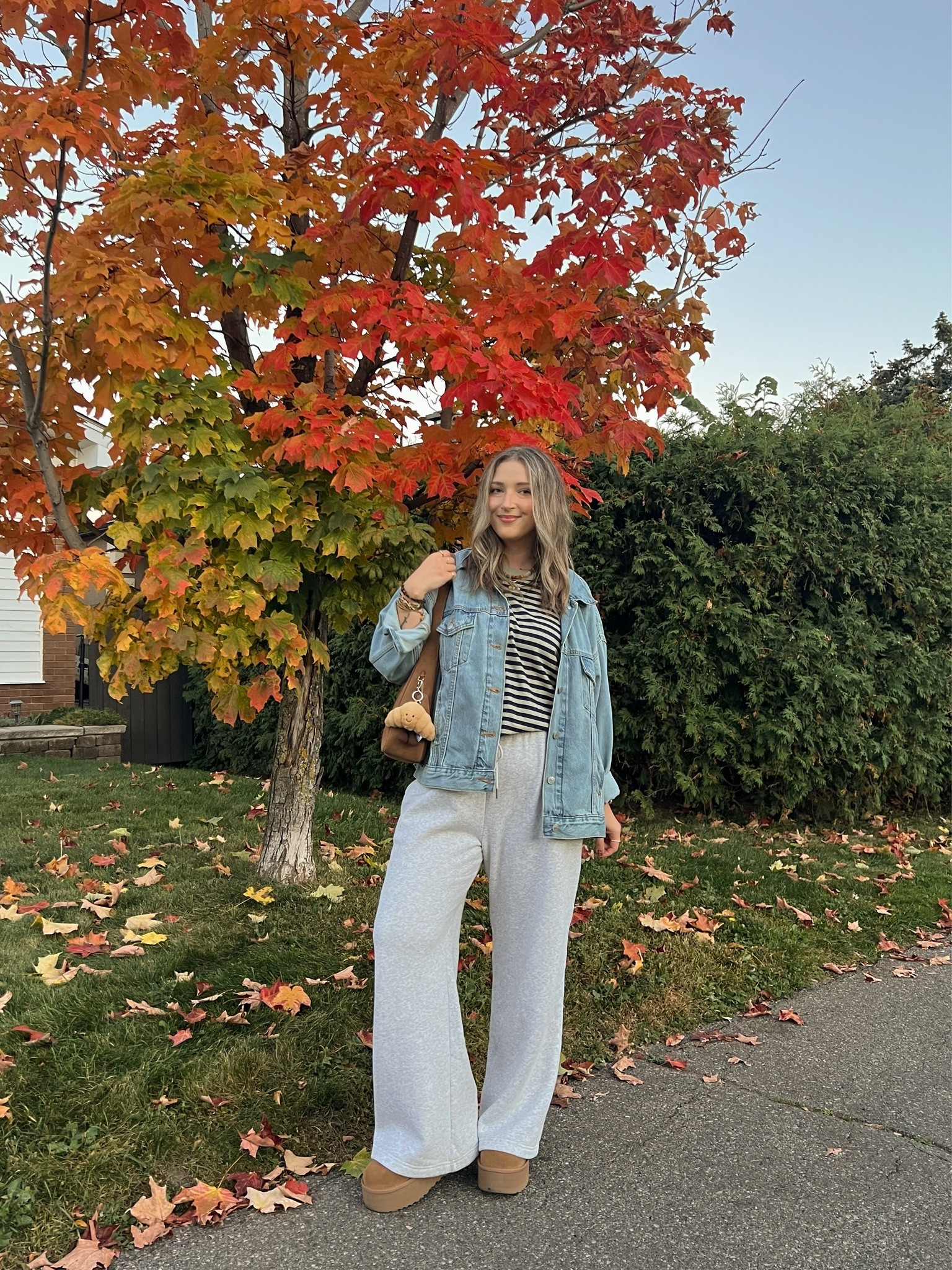 Comfy fall outfit! Wearing size L in the sweatpants and striped tee. Sized up to XL in the denim jacket for an oversized fit. I’m a 9.5-10 shoe and wear a 10 in the Uggs

#LTKfall #LTKstyletip #LTKsale