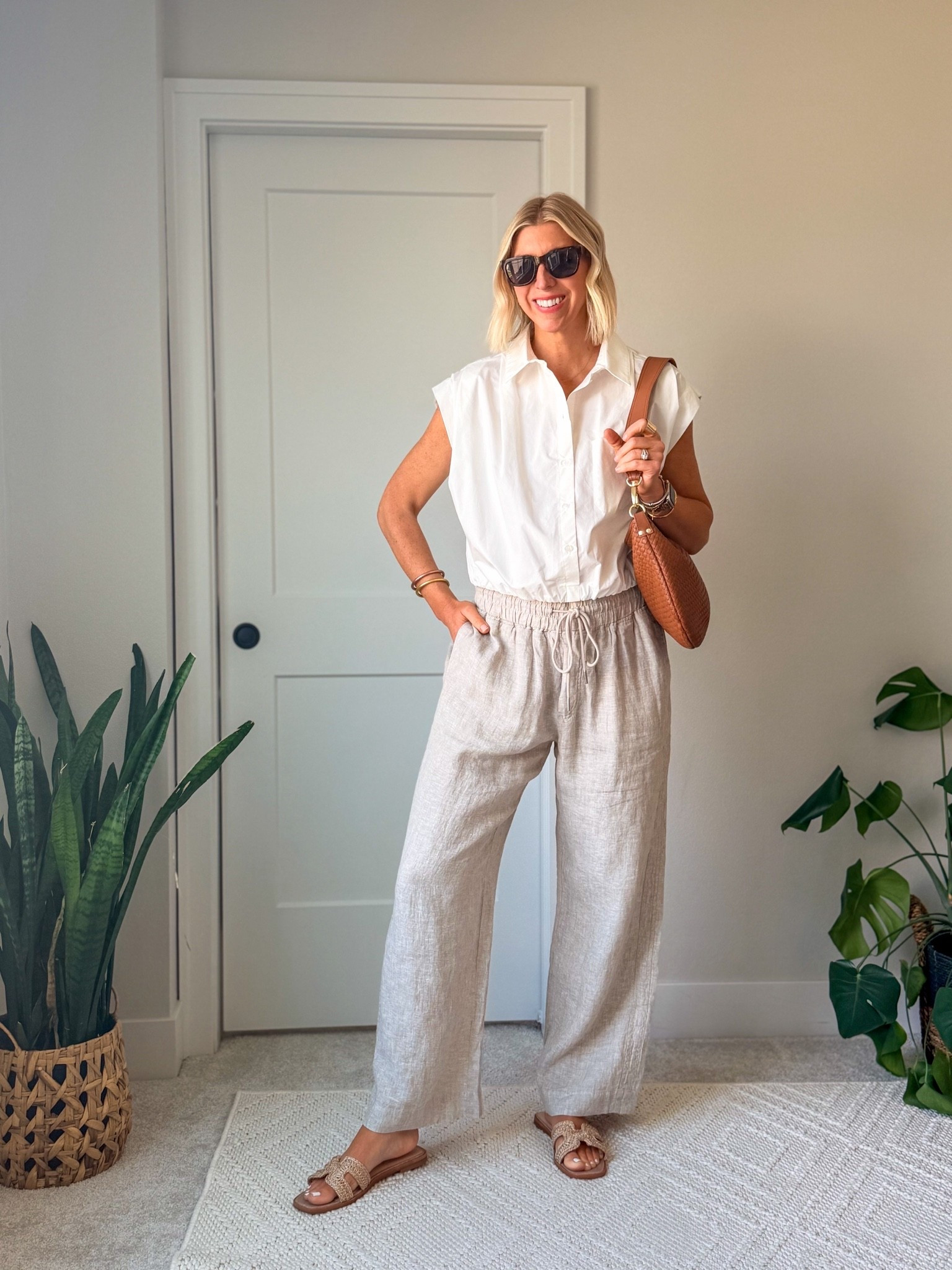 Soft Girl Summer staple: linen wide-leg pants 🤎

Breathable, comfortable, and instantly elevated — especially when you swap the basic tee or tank for a crisp cotton blouse.

This is the kind of outfit that feels easy in the heat but still looks polished: relaxed linen pants, a lightweight blouse, flat sandals, sunglasses, and a woven shoulder bag.

Simple formula, effortless summer look.

Linking this full outfit + similar linen pants, cotton blouses, summer sandals, and bags here. #LTKStyleTip #LTKSummer #LTKFinds

#LTKootd #LTKSeasonal #LTKOver40