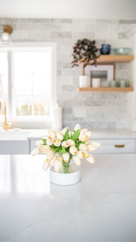 Beautiful artificial tulips and glass vase for your spring home decor, coastal style

#LTKhome #LTKfamily