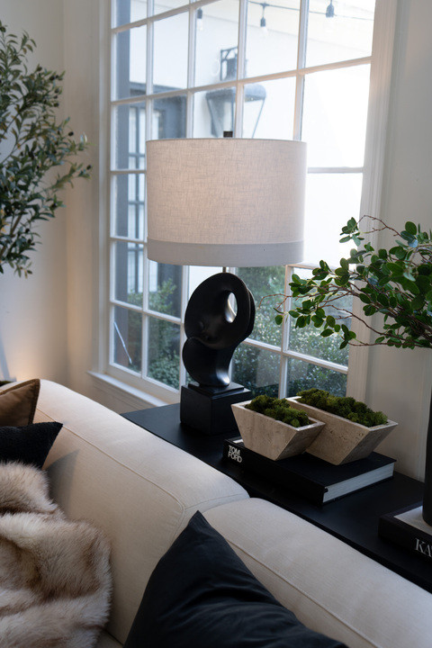 Stoppp I love how this living room styling turned out!! Minimalist decor, organic textures, stacked books, statement lamp and natural light making everything feel fresh and sophisticated. This calm cozy aesthetic is exactly the modern home vibe I wanted and I cannot get enough.  

 #LTKmomlife #LTKSeasonal #LTKHome