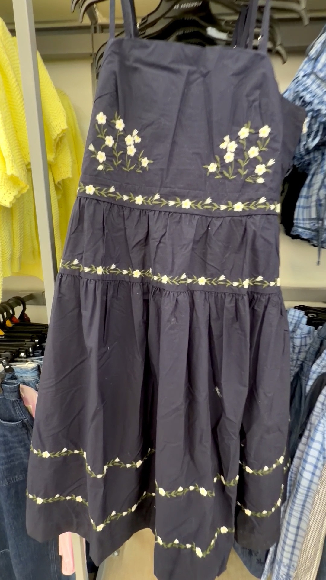 This navy dress with the sweetest little embroidered flowers is such a hidden gem 💙🌸

The spaghetti straps keep it light and perfect for warmer days, but throw on a cardigan and it instantly transitions into the cutest layered look.

It’s feminine, easy, and one of those dresses that makes you feel pretty the second you put it on ✨

You can dress it up or keep it casual… either way, she’s a yes 👏
#springdress #floraldress #femininefashion #midstylefashion #over50style #layeredlook #affordablefashion #ltkstyle #everydayoutfits #springstyle

#LTKgrwm #LTKOver40 #LTKootd