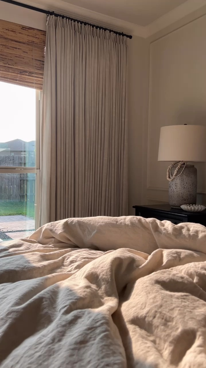 Neutral linen duvet, linen drapes, and neutral art for our primary bedroom



#LTKHome