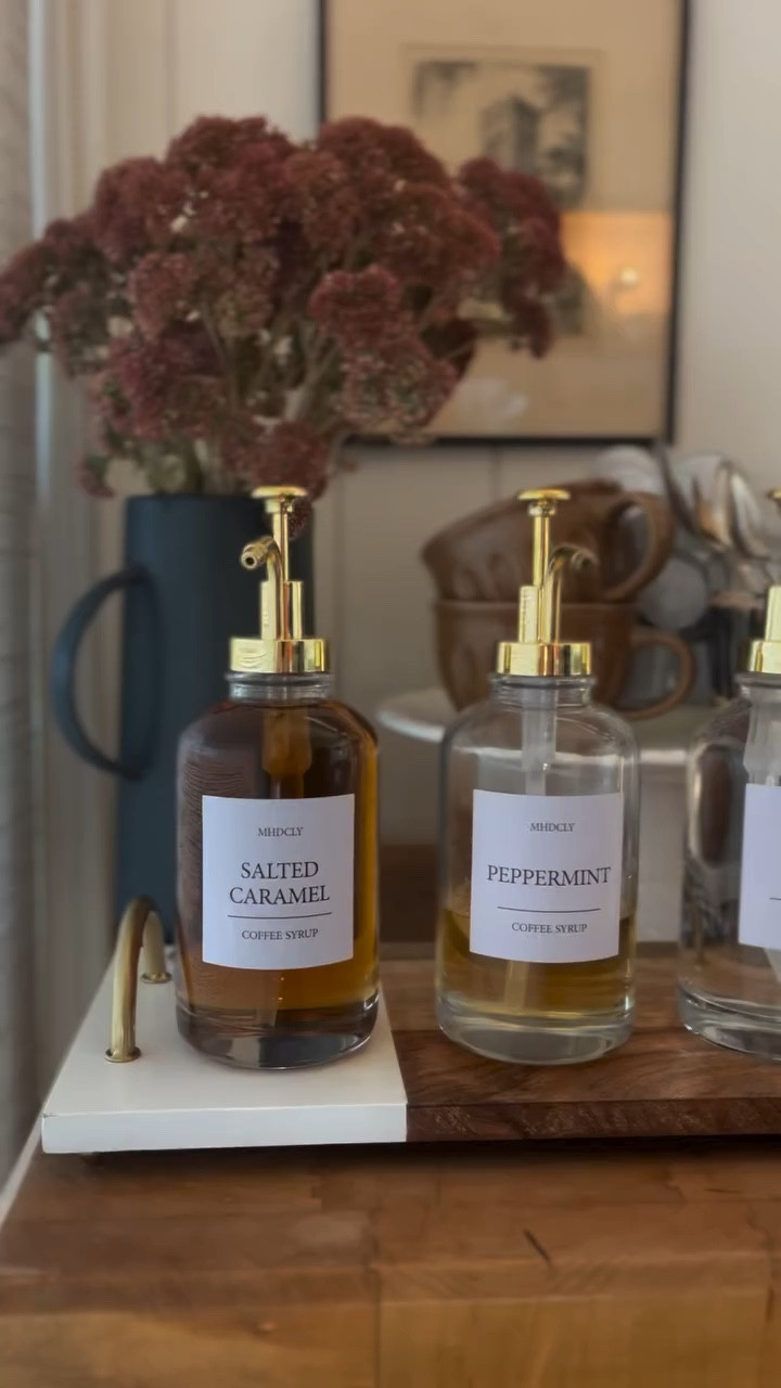 𝕀’𝕞 𝕟𝕠𝕥 𝕘𝕠𝕠𝕕 𝕒𝕥 𝕕𝕖𝕔𝕠𝕣𝕒𝕥𝕚𝕟𝕘

Have you ever wanted to try something in your house but talked yourself out of it?

Seen a fun idea online and thought, “I could never pull that off.”

Well I have 2 secrets for you:

1. Almost everyone feels that way.
2. The only way to learn is to try.

Reps lead to mastery. It’s true in every area of life, and decorating your house is no different.

I bought these cute coffee syrup dispensers and wanted to set up a Fall hot cocoa bar for the kids. But when I put everything on there it looked… off. 

So I waited a few days and tried again. I added a vase with some dried flowers from the backyard. Better. But still not quite right.

I added a box for the cocoa pods. That looked wrong so I took it away and put them in a clear glass case.

Better, but boring (and hard to reach tucked way in the back).

Later I walked around the house to find something I could use to lift them up higher, and saw a cake stand. Perfect!

This area wasn’t a one and done. I had to keep working on it over time. And in a month, I’ll probably try something else in this corner.

Playing and experimenting is how you learn what you like and develop an eye for arranging things.  If you get stuck, look up examples online for other ideas to try.

Try something new this week! In a small corner, on your coffee table, on your nightstand… anywhere.
Practice makes perfect!

#coffeebar #coffeebardecor #coffeecart #coffeestation #coffeegram #cocoabar #falldecor #kitchenstyling