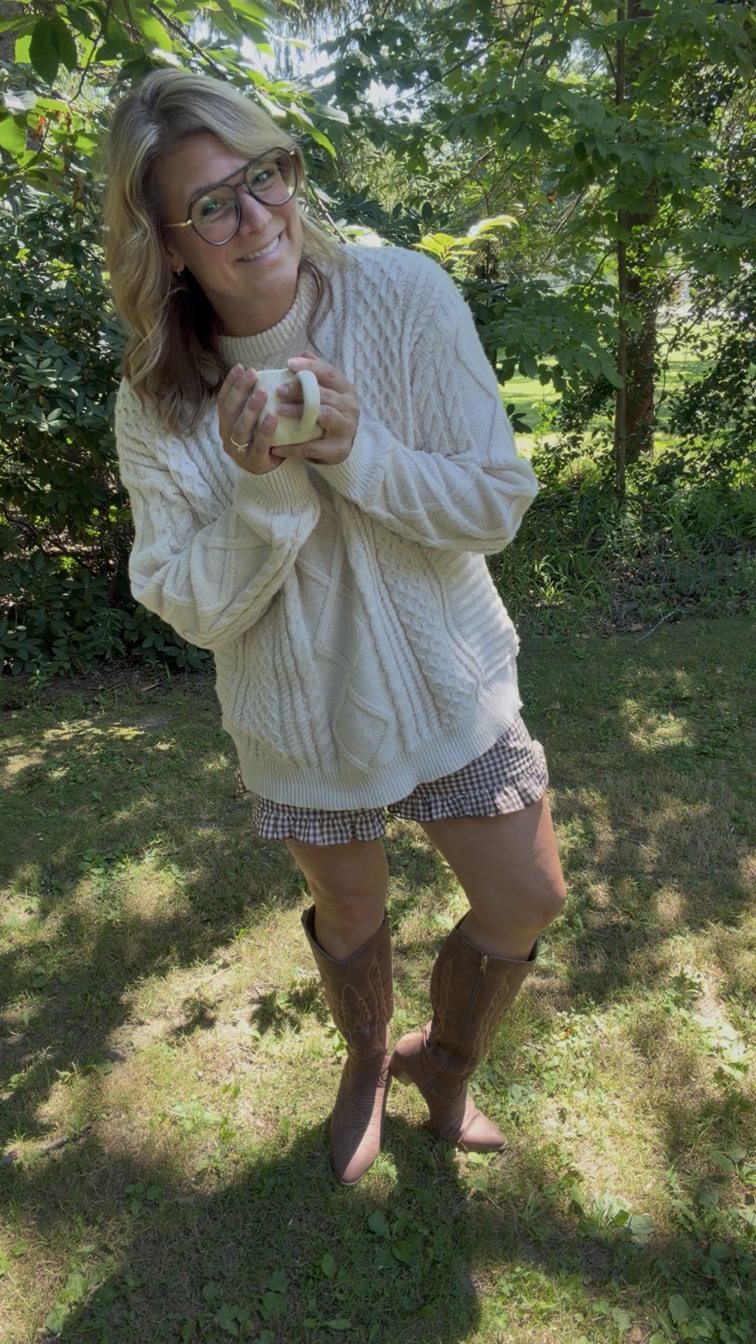 Okay but THIS is my kind of fall outfit. 🤎🍂

A cozy oversized cable-knit sweater + the cutest little gingham shorts + tall cowboy boots = the perfect mix of cozy & cute! 

I love an outfit that looks put together without feeling like I tried too hard. And these pieces are so easy to mix and match all season long—swap the shorts for jeans, add tights when it gets colder, or throw on a jacket for an extra layer.

Basically… if you’re looking for an easy fall outfit that makes you feel cute without sacrificing comfort, this is it. 🫶🏻 #FallOutfitIdeas #FallFashion #MidsizeStyle

#LTKTall #LTKMidsize #LTKOver40