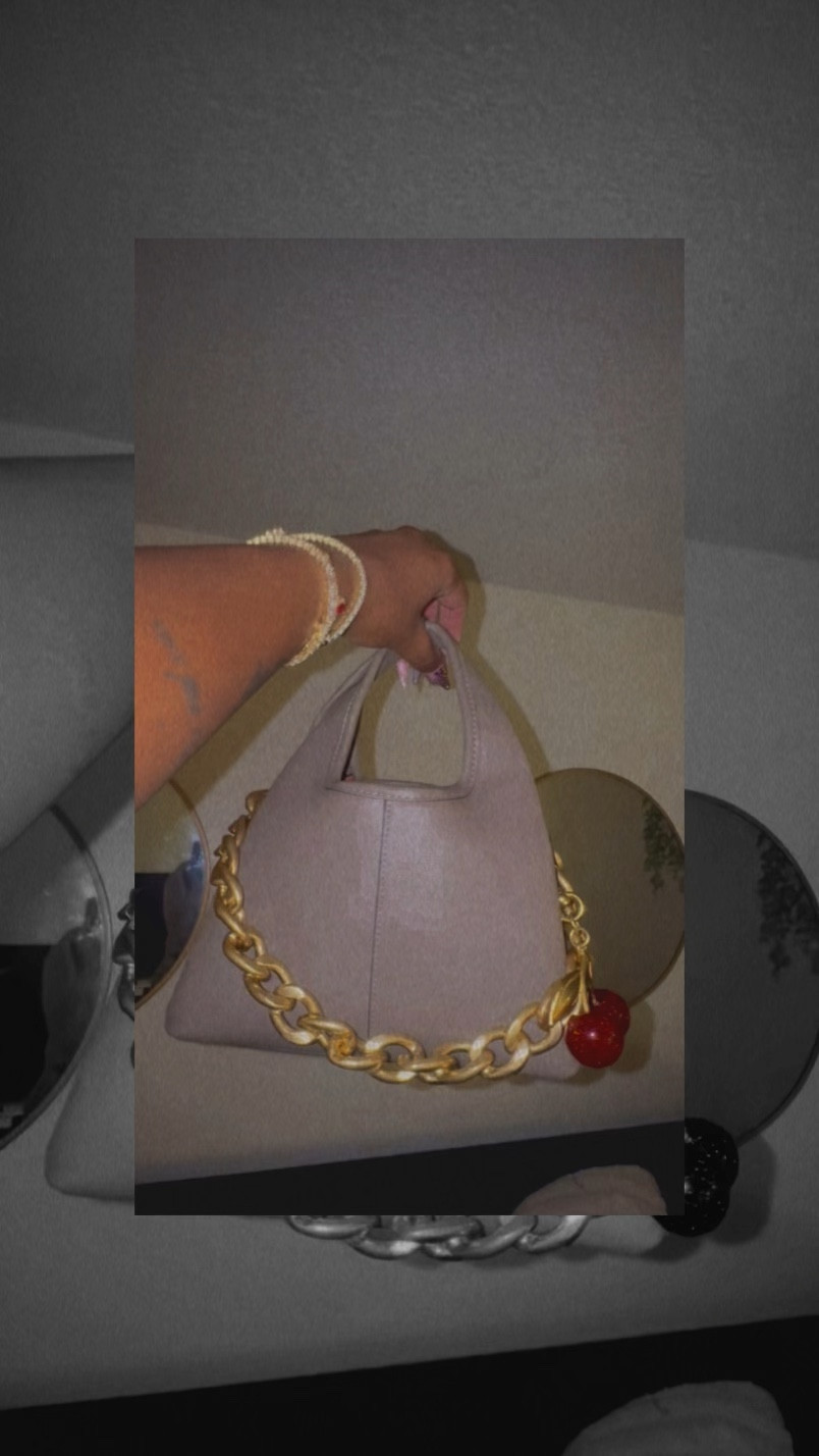 Everyday purse with chunky gold accessories 