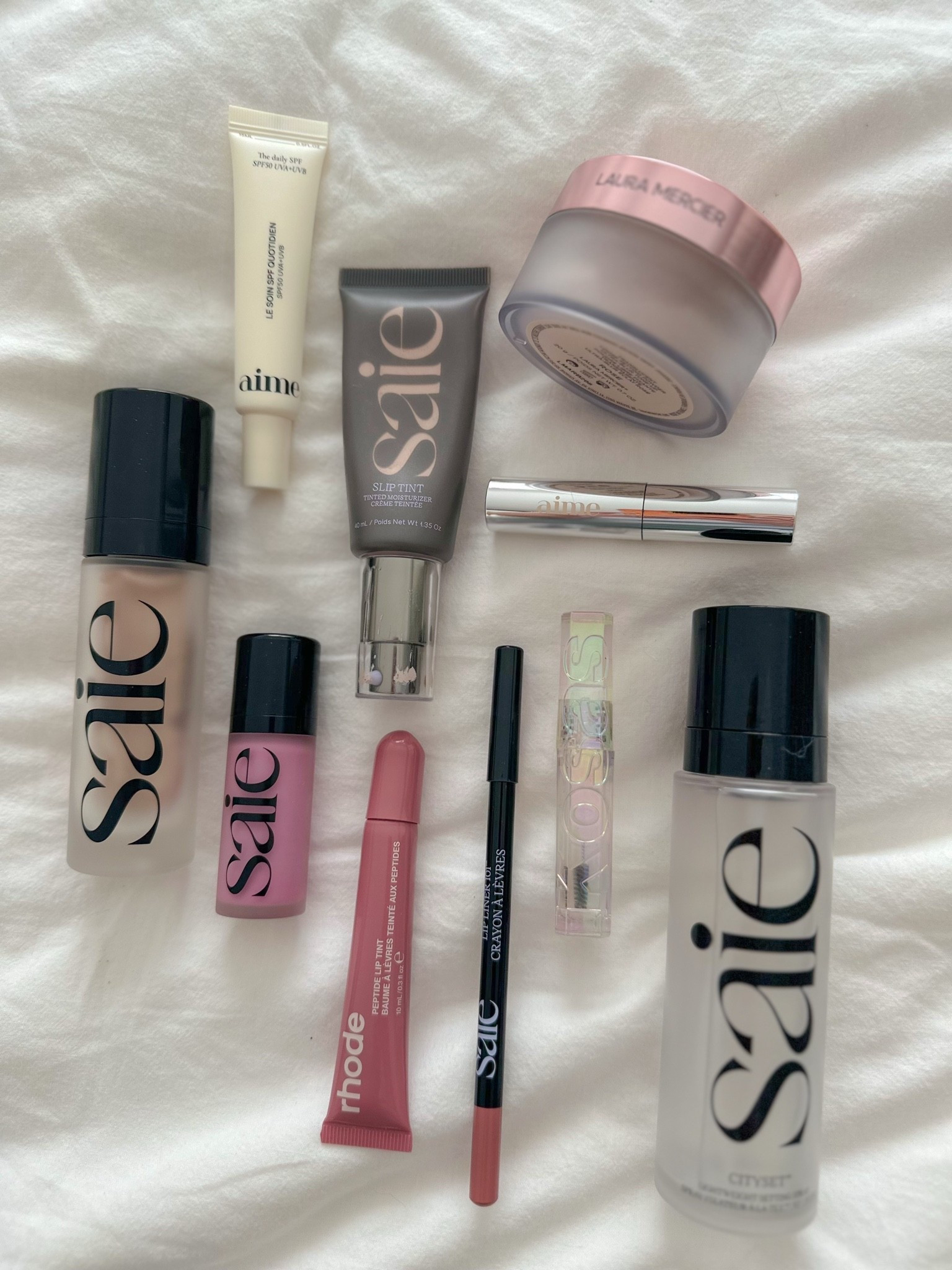 My daily make-up routine 🩷 

1. Aime SPF
2. Saie glowy supergel in starglow
3. Saie slip tint in shade 1
4. Saie dew blush in baby
5. Laura Mercier translucent ultra blur setting powder in rose
6. Aime volume mascara
7. Saie lip liner in wink
8. Rhode lip treatment in salty tan
9. Kosas brow gel
10. Saie city set setting spray 
🤍

#LTKgrwm #LTKselfcare #LTKBeauty