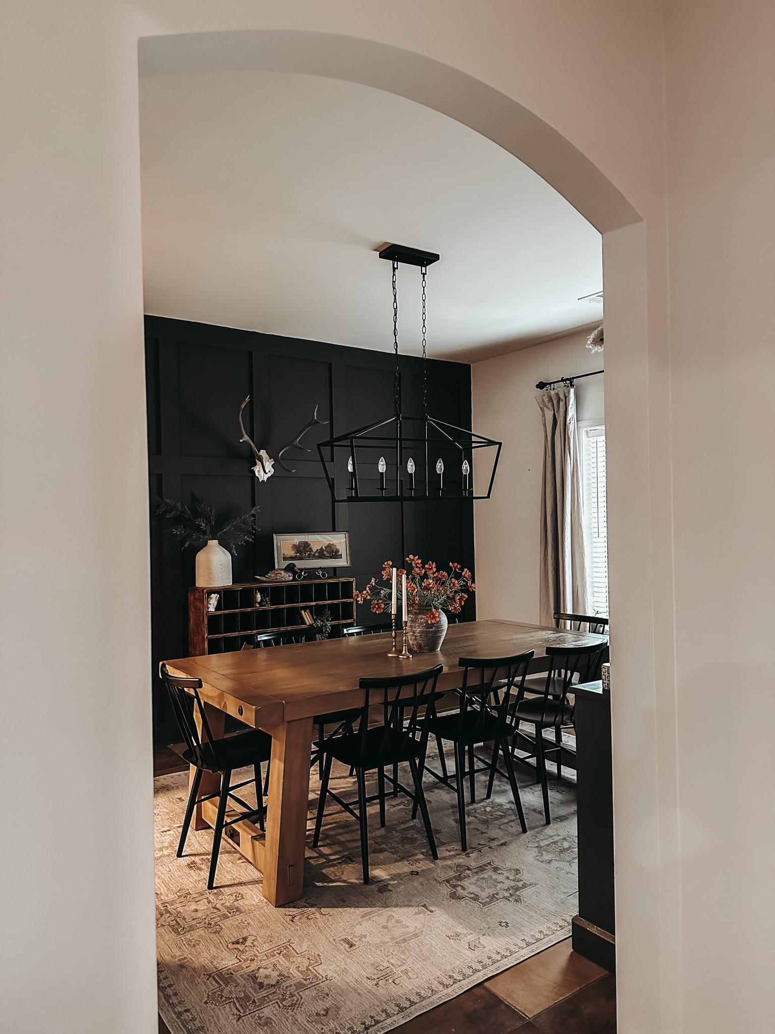 Simple, clean classic. Dining room table that seats 8 with a washable rug for the messy littles!

#LTKHome
