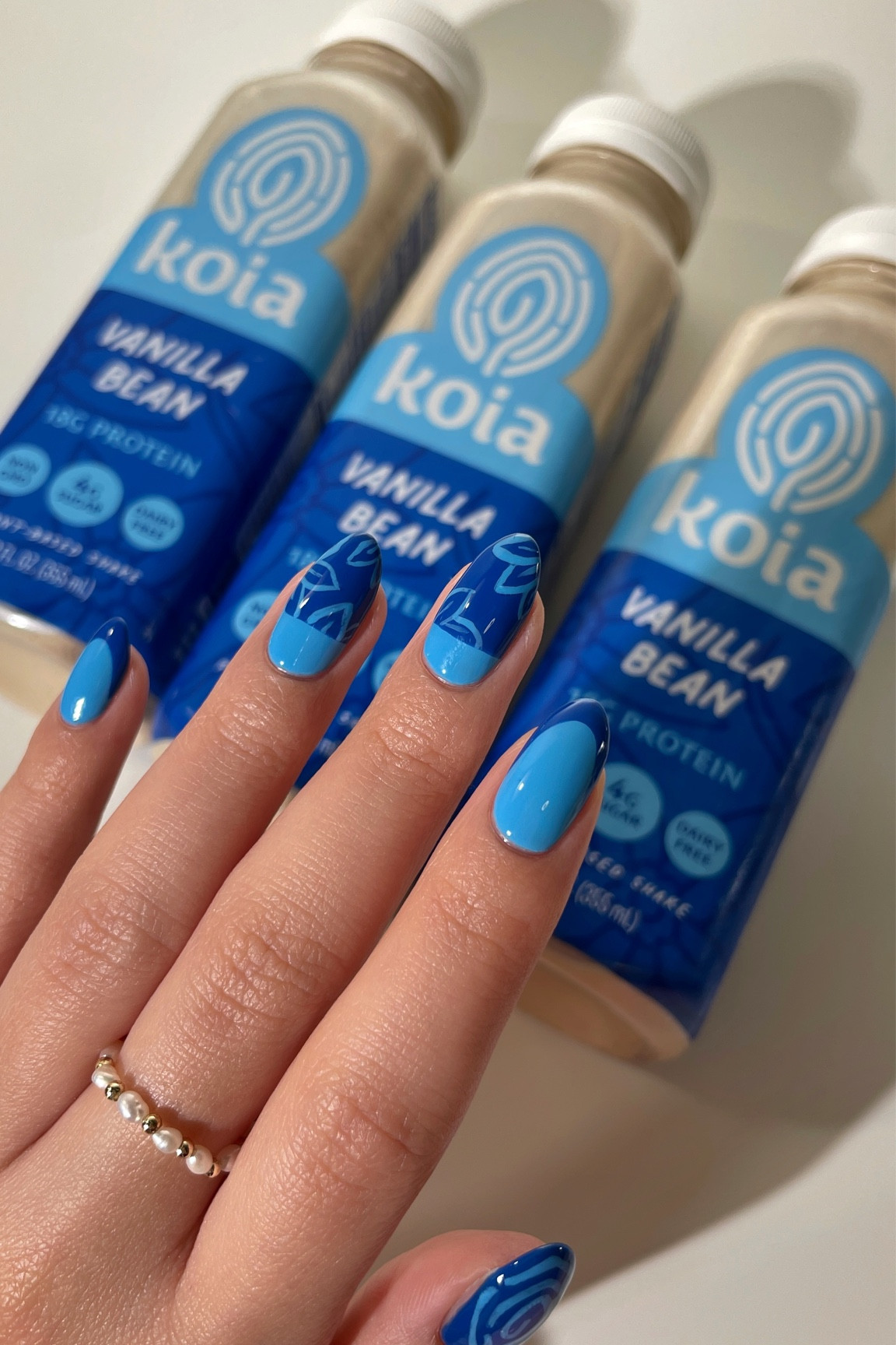 Matching my nails to my favorite high-protein, plant-based, low-sugar drink,  Koia! 💙🤍 I’ve been really pushing myself in my workouts recently, and these drinks have been the perfect post-workout & recovery treat 😋💪🏼

#LTKfitness #LTKbeauty