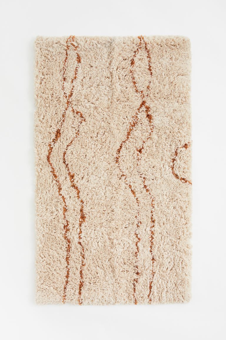 Patterned rug in woven cotton fabric with pile. | H&M (US + CA)