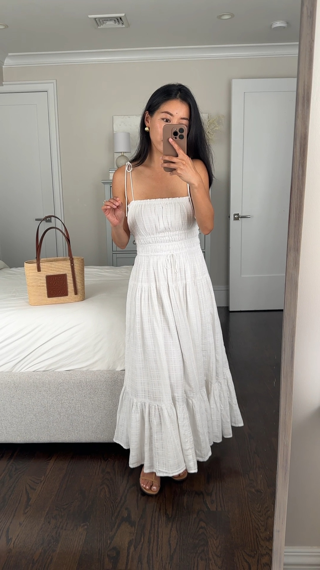 One more classic white cotton summer dress. 

Compared to the poplin maxi that’s also linked, this one has more flow, flexibility and stretch all around with a lighter weight gauzy cotton  fabric. 

Fits beautifully in xxs off the rack on me. smocked waist with stretch all around, stretch around the top of bust, and adjustable feminine spaghetti style straps. Cotton gauze fabric is airy and comfy with a lined skirt and bodice.

This should be early bump friendly due to the waist stretch and is nursing friendly. 

#petite friendly summer outfits , engagement photos, bridal shower dress

#LTKparties #LTKtravel #LTKwedding