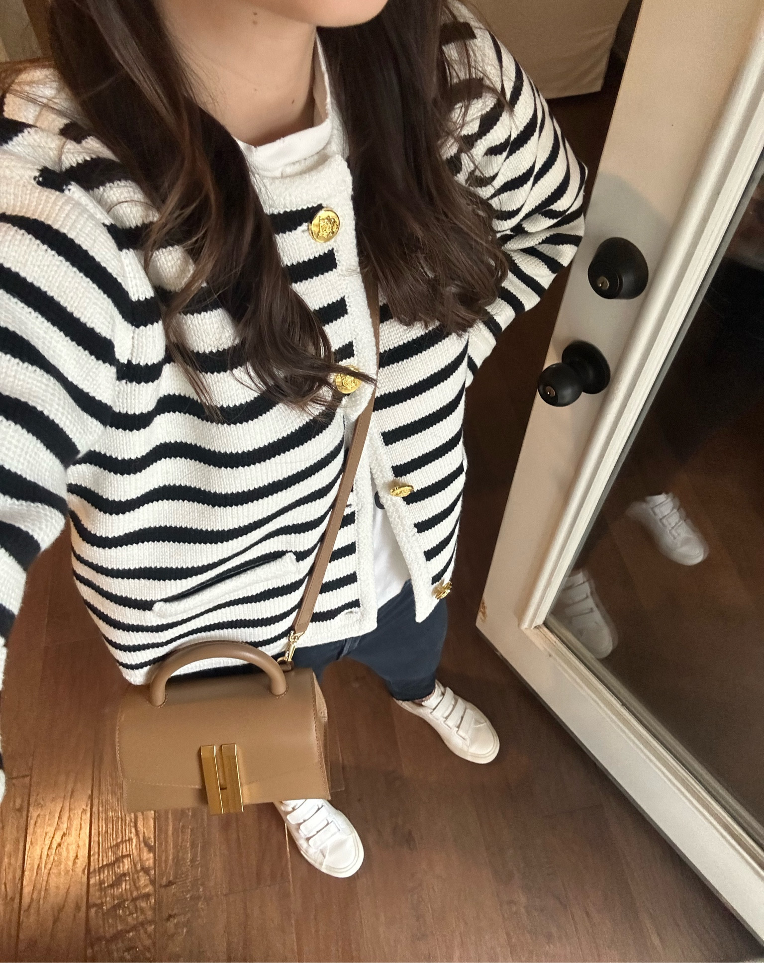 Black and white striped cardigan with gold buttons - Kate Middleton’s Demellier micro handbag - veja velcro sneakers - the softest Mother kick crop jeans 