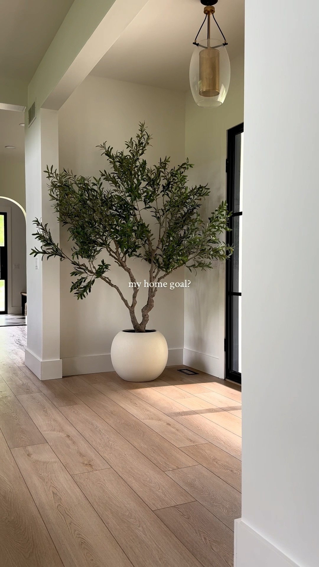 My home goal is peace 🤍
Less noise. Less clutter. More intention.

Room to breathe, space to play. Spaces that calm the nervous system and make room for what matters most.

*Entry faux olive tree + pot is from Costco but has been out of stock for several months 

#homegoals #homeinspiration 

#LTKSaleAlert #LTKHome