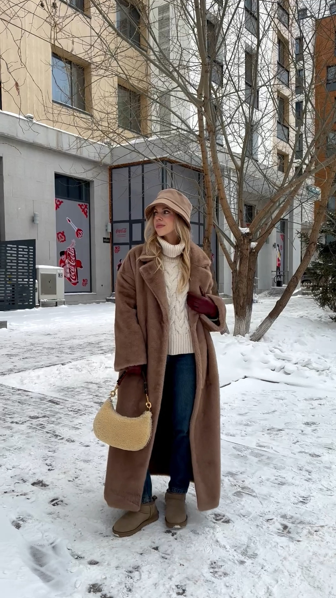 Camel fur coat, cozy holiday shopping look, Christmas market outfit, cable knit sweater, Zara mom jeans, Ugg ultra mini boots, shearling handbag 

#LTKHoliday #LTKOver40 #LTKFindsUnder50