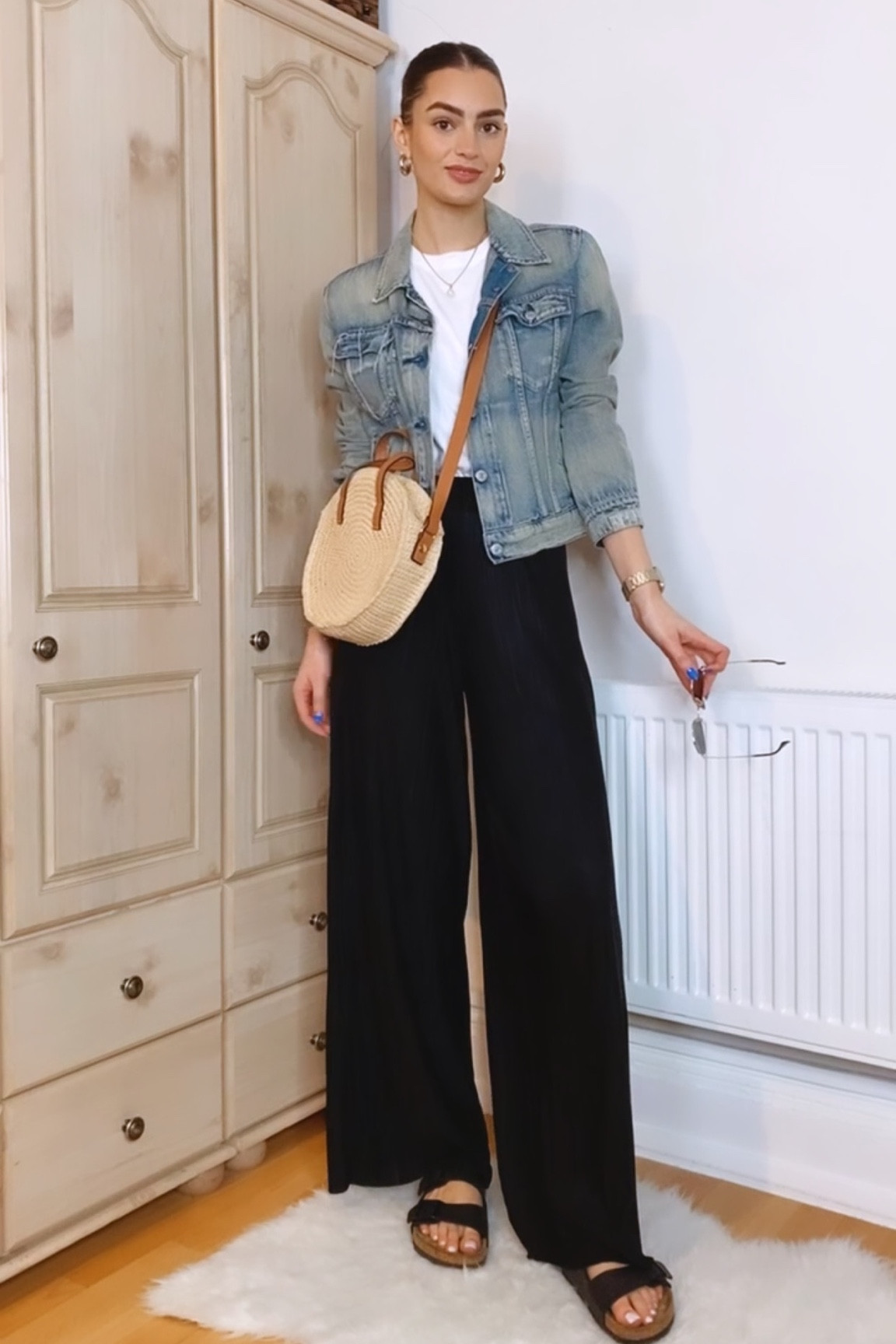 Casual outfit idea for the weekend: denim jacket, white oversized Tshirt, black wide leg trousers, birkenstocks, round straw bag, RayBan sunglasses

#LTKSeasonal #LTKstyletip